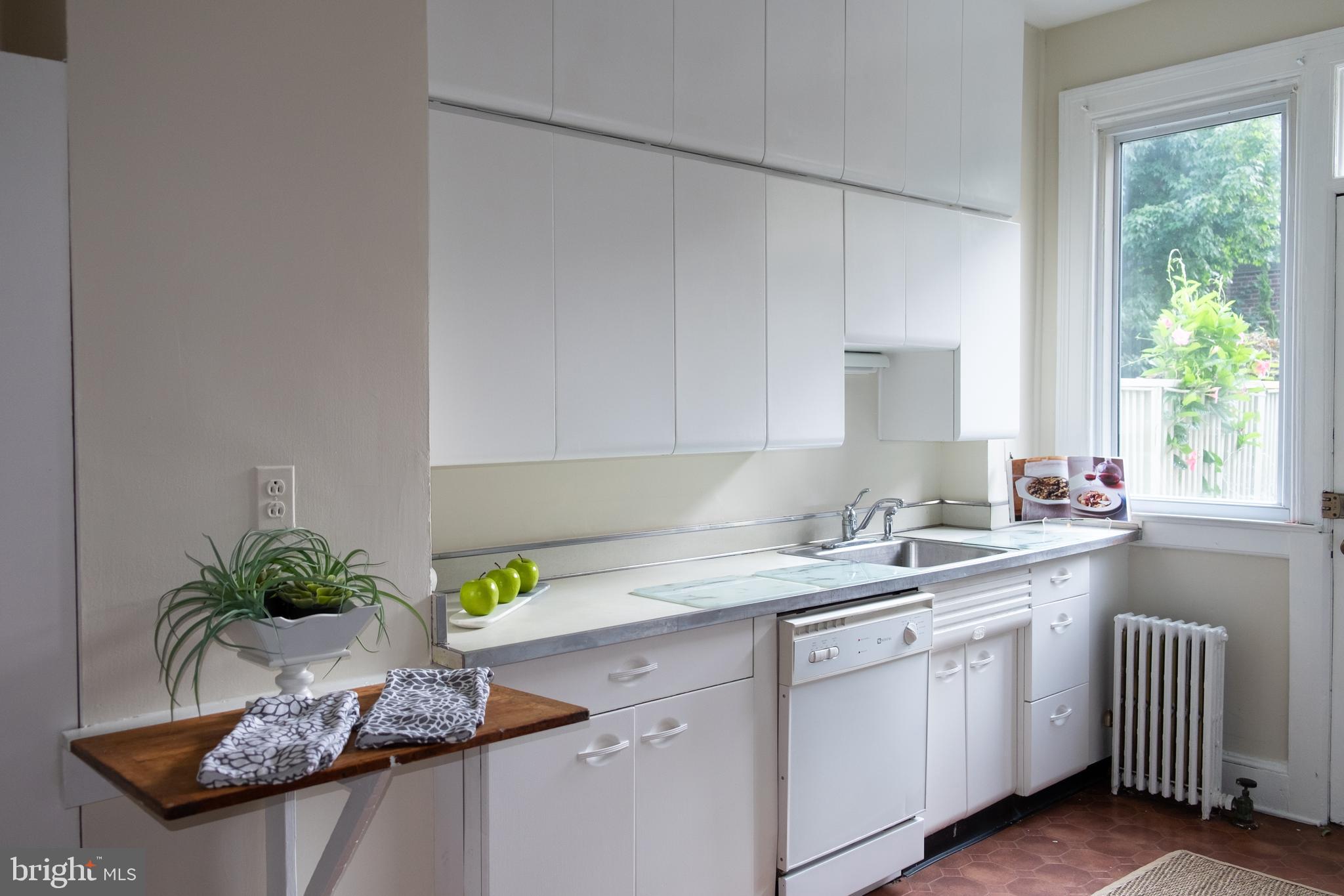 3931 Cloverhill Road Baltimore, MD 21218 - Photo 25 of 32 Kitchen with Ample Cabinetry
