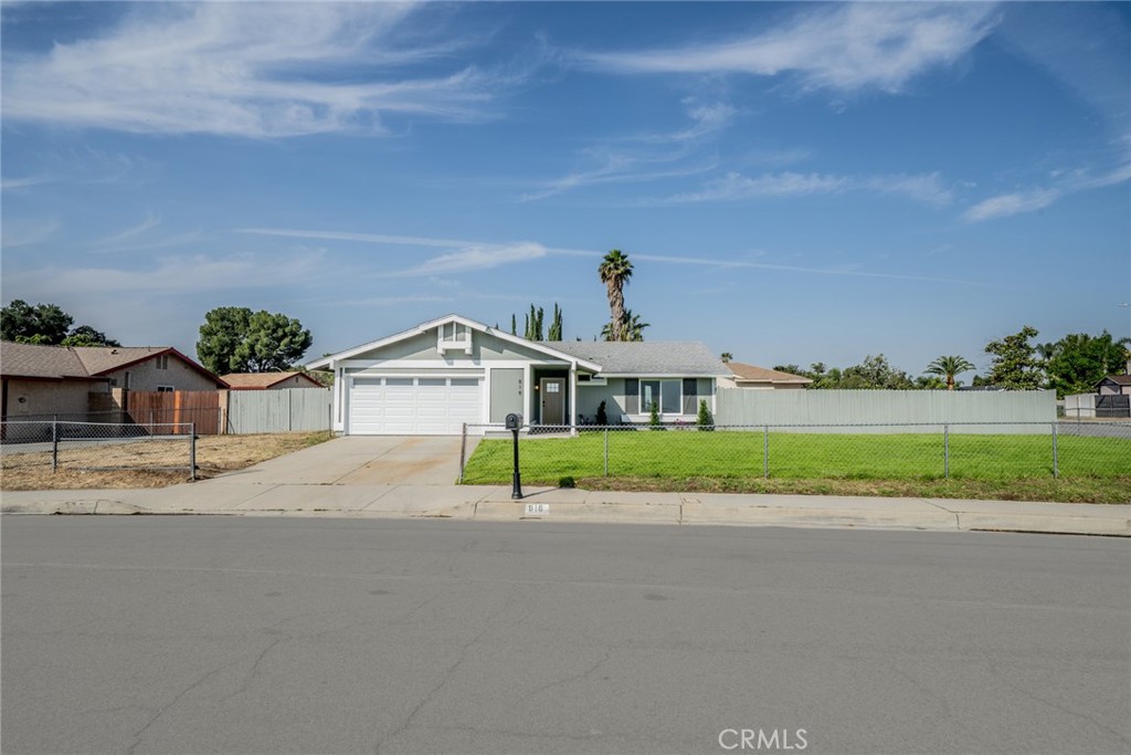 818 Terrace Road San Bernardino, CA 92410 - Photo 1 of 44 a view of house with a big yard and large trees