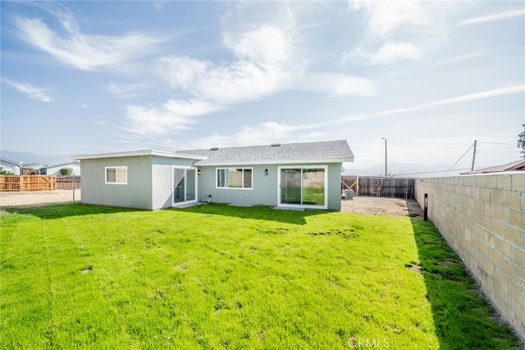 818 Terrace Road San Bernardino, CA 92410 - Photo 32 of 44 a view of a house with backyard and garden