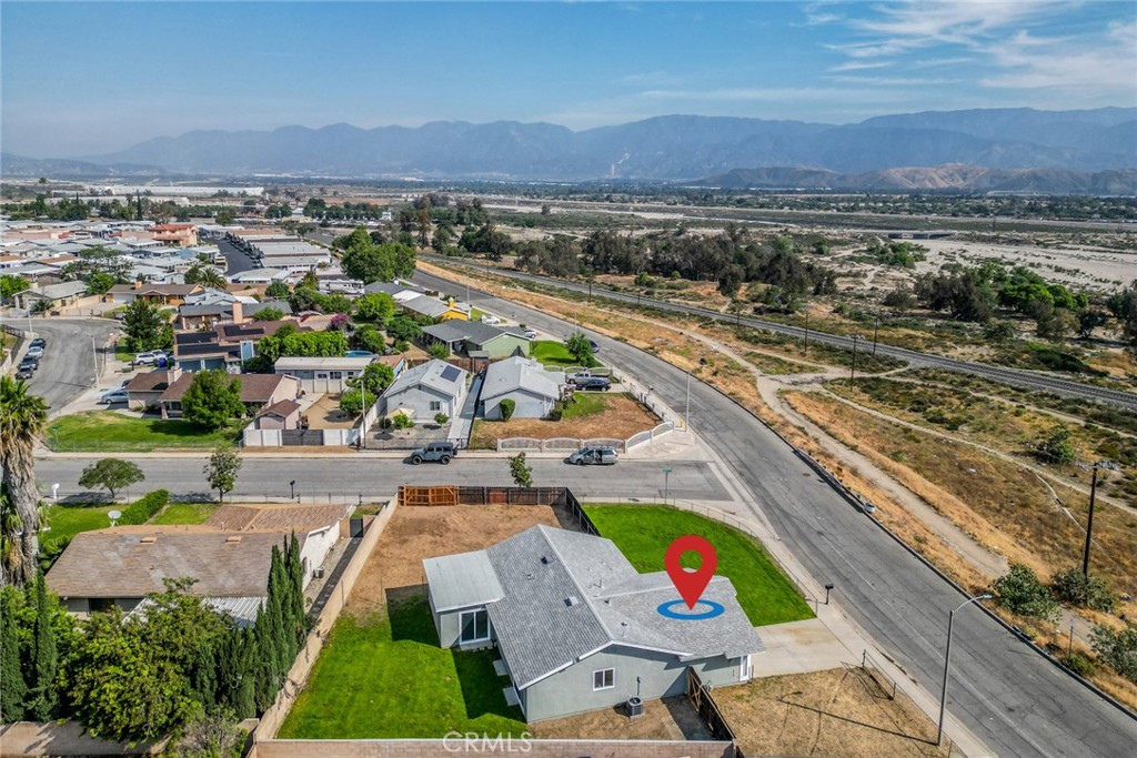 818 Terrace Road San Bernardino, CA 92410 - Photo 39 of 44 an aerial view of residential houses with outdoor space and swimming pool