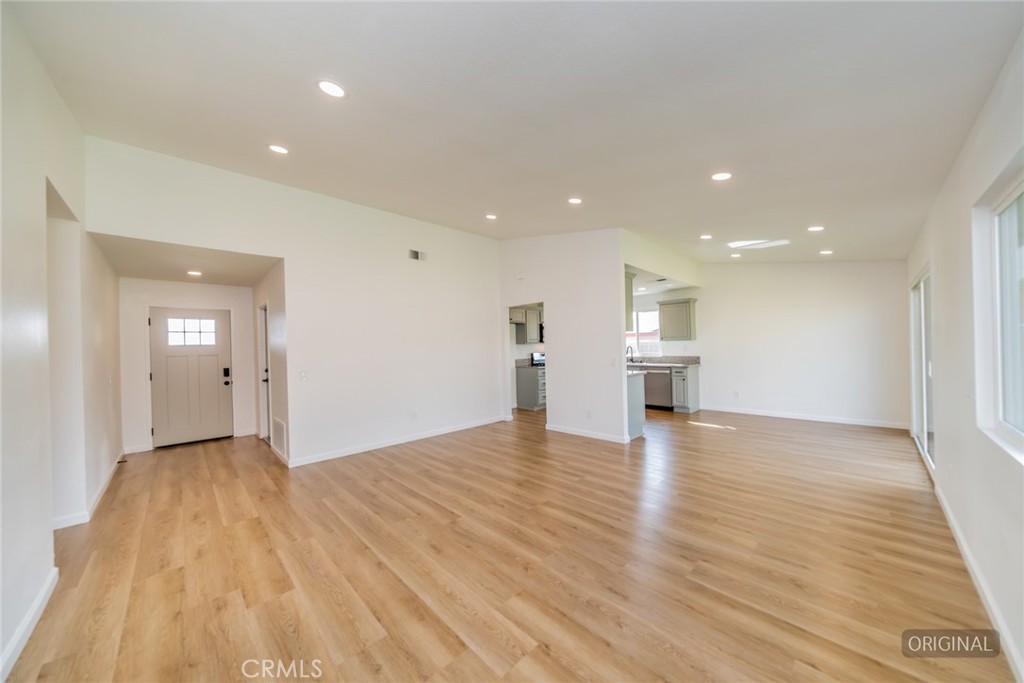 818 Terrace Road San Bernardino, CA 92410 - Photo 6 of 44 a view of empty room with wooden floor