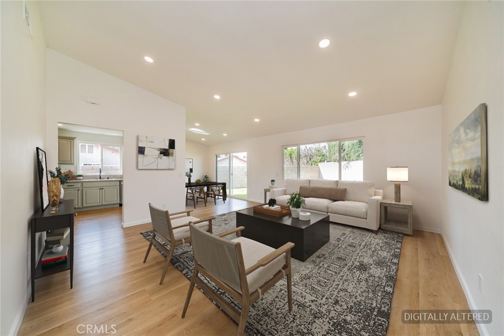 818 Terrace Road San Bernardino, CA 92410 - Photo 7 of 44 a living room with fireplace furniture and a flat screen tv