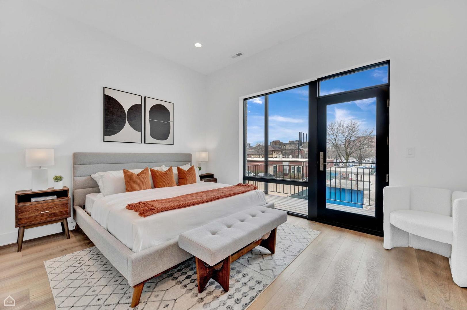 1607 West 13th Street, Unit 200 Chicago, IL 60608 - Photo 11 of 17 a bed room with a bed and a large window