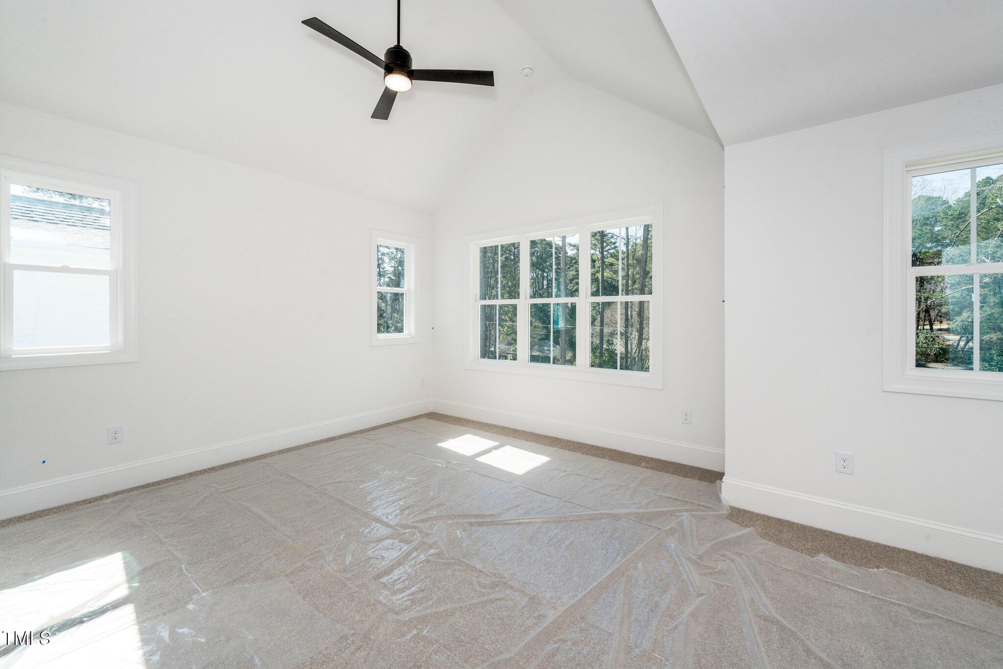 1211 Chaney Road Raleigh, NC 27606 - Photo 23 of 36 an empty room with windows