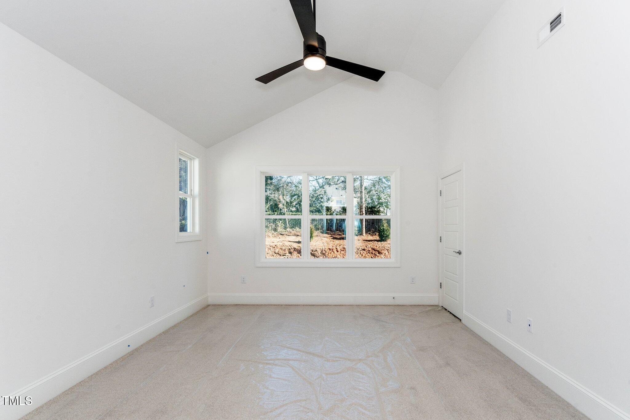 1211 Chaney Road Raleigh, NC 27606 - Photo 28 of 36 an empty room with windows