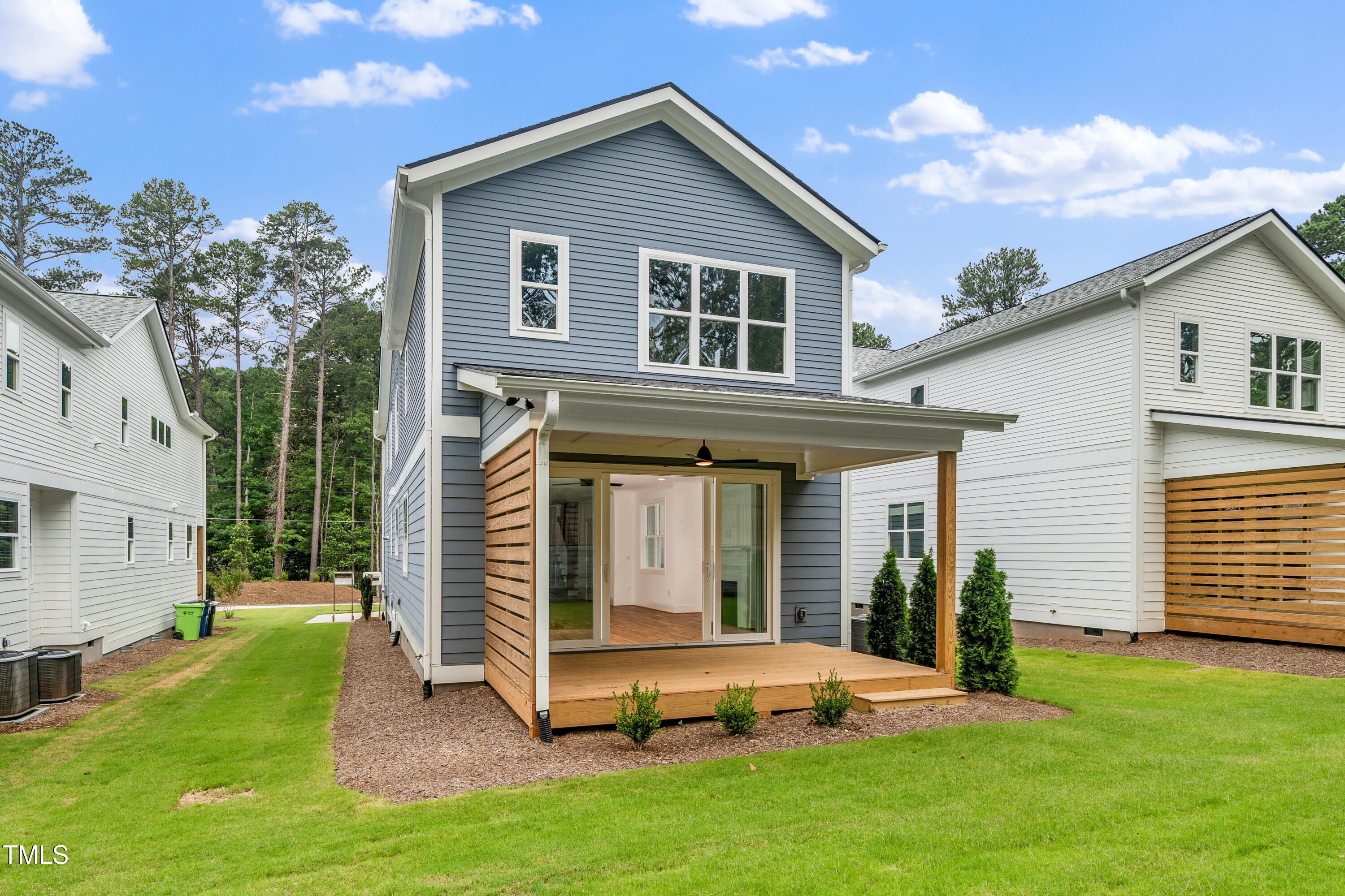 1211 Chaney Road Raleigh, NC 27606 - Photo 32 of 36 a view of a house with a yard