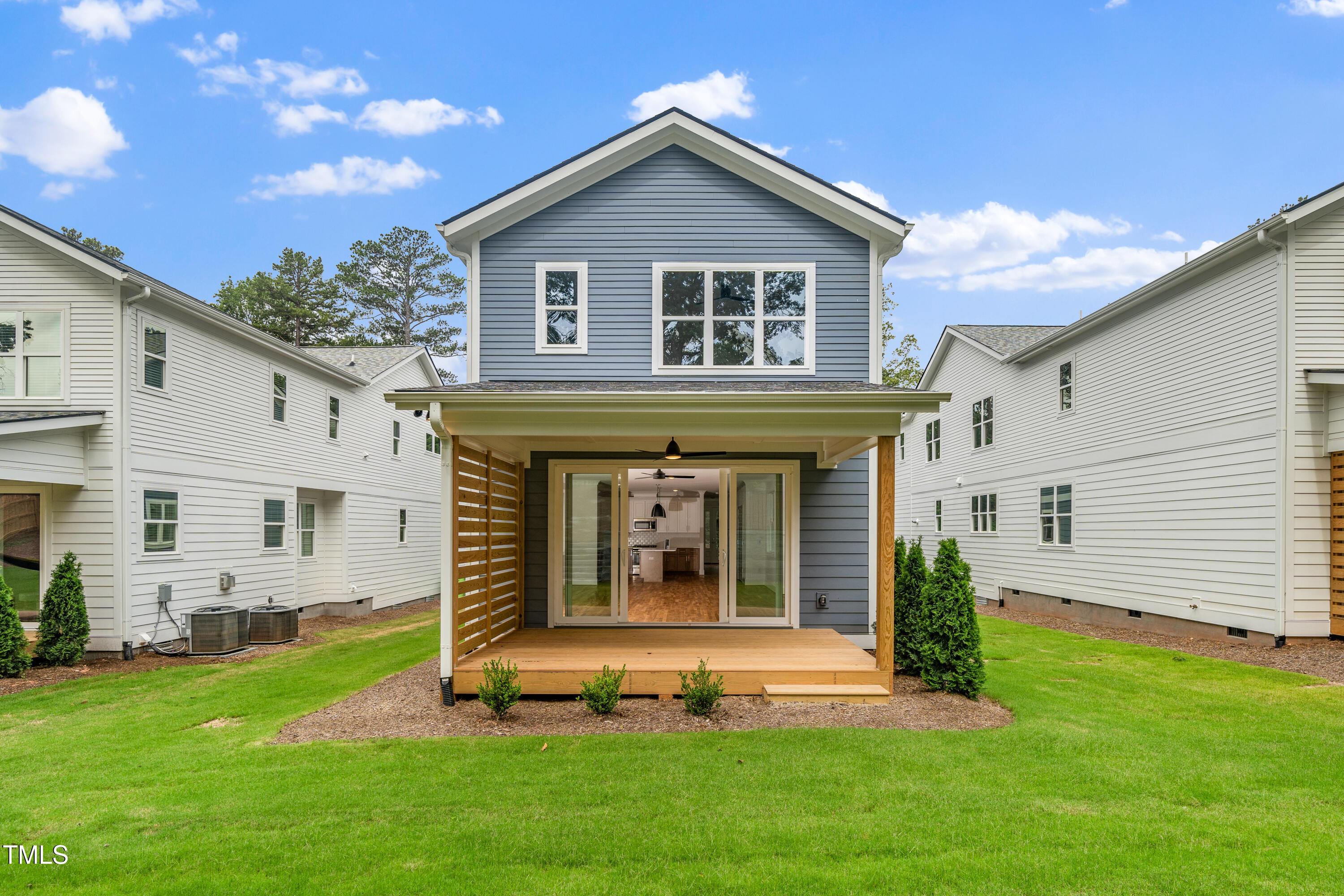 1211 Chaney Road Raleigh, NC 27606 - Photo 33 of 36 a view of a house with a yard