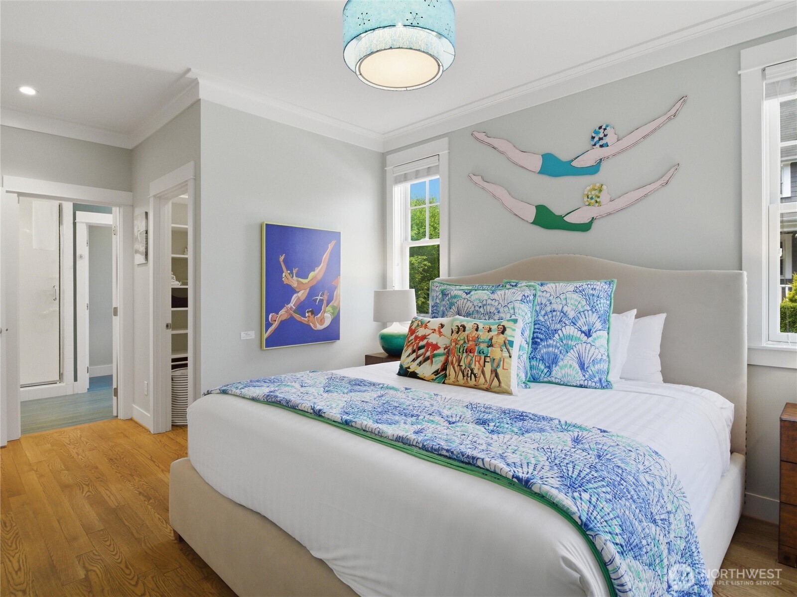 269 Compass Street Pacific Beach, WA 98571 - Photo 15 of 38 a bedroom with a bed and painting on the wall