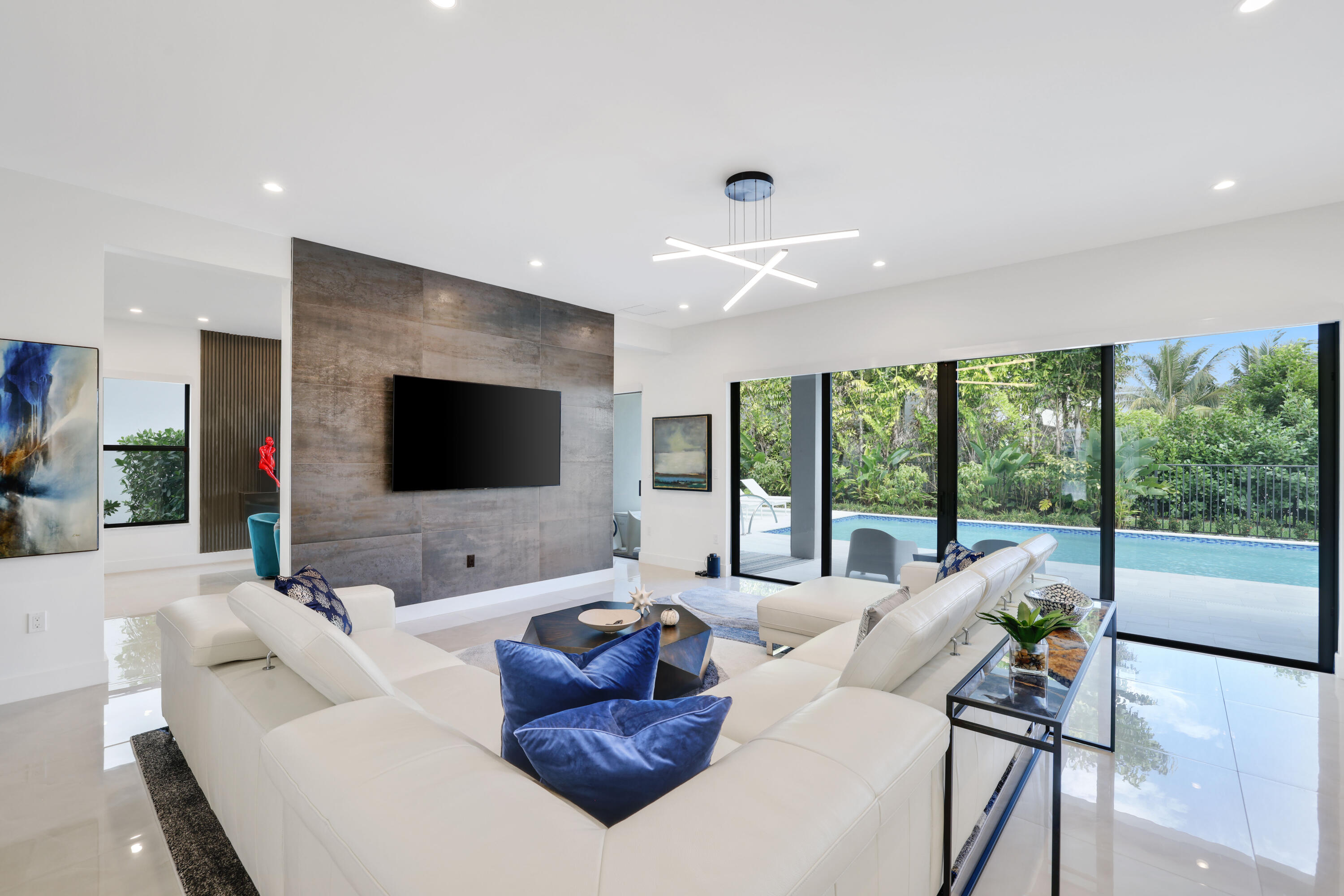 17052 Rainbow Fls Trail Boca Raton, FL 33496 - Photo 18 of 96 a living room with furniture and a flat screen tv