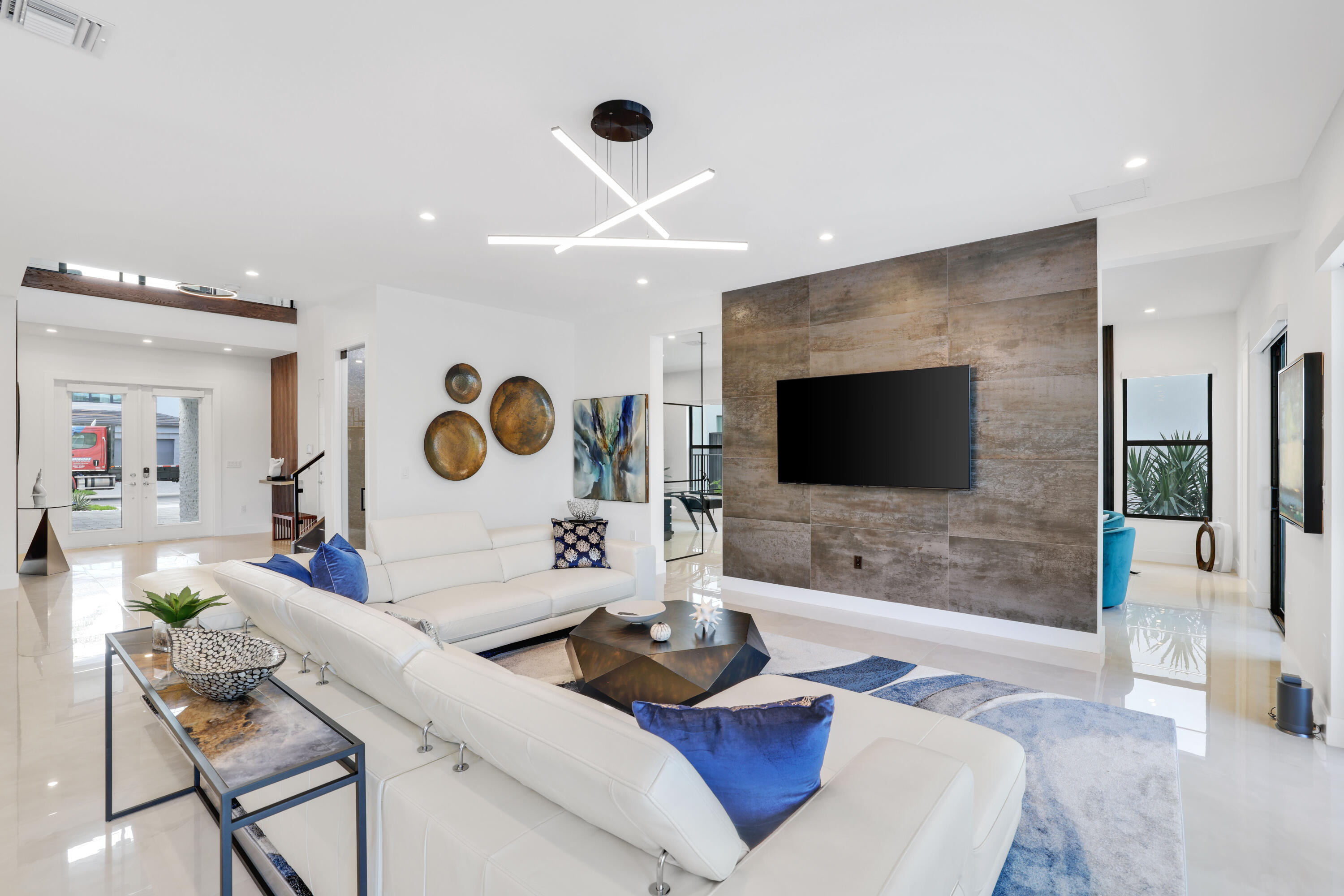 17052 Rainbow Fls Trail Boca Raton, FL 33496 - Photo 21 of 96 a living room with furniture and a flat screen tv