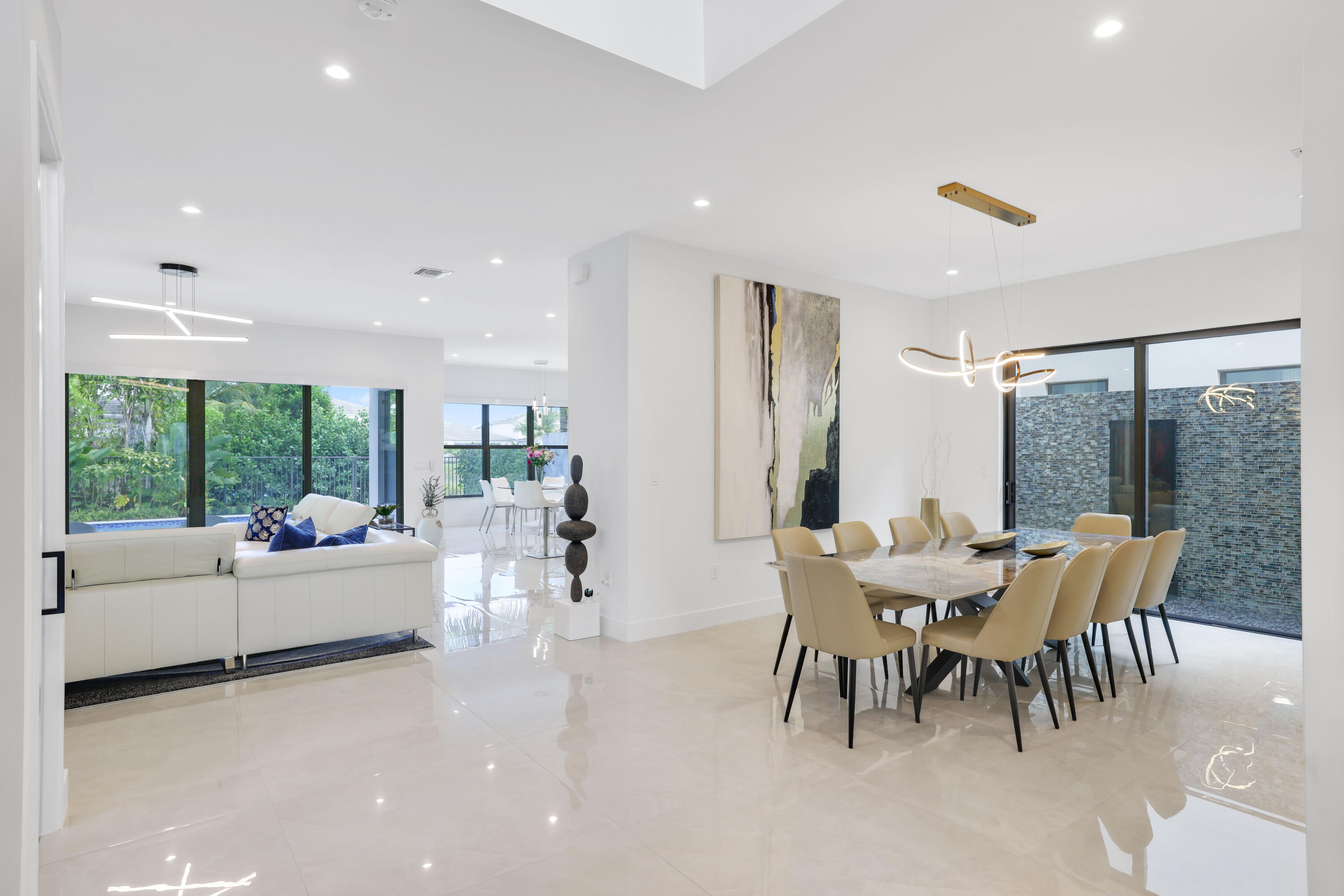 17052 Rainbow Fls Trail Boca Raton, FL 33496 - Photo 22 of 96 a living room with furniture and a large window