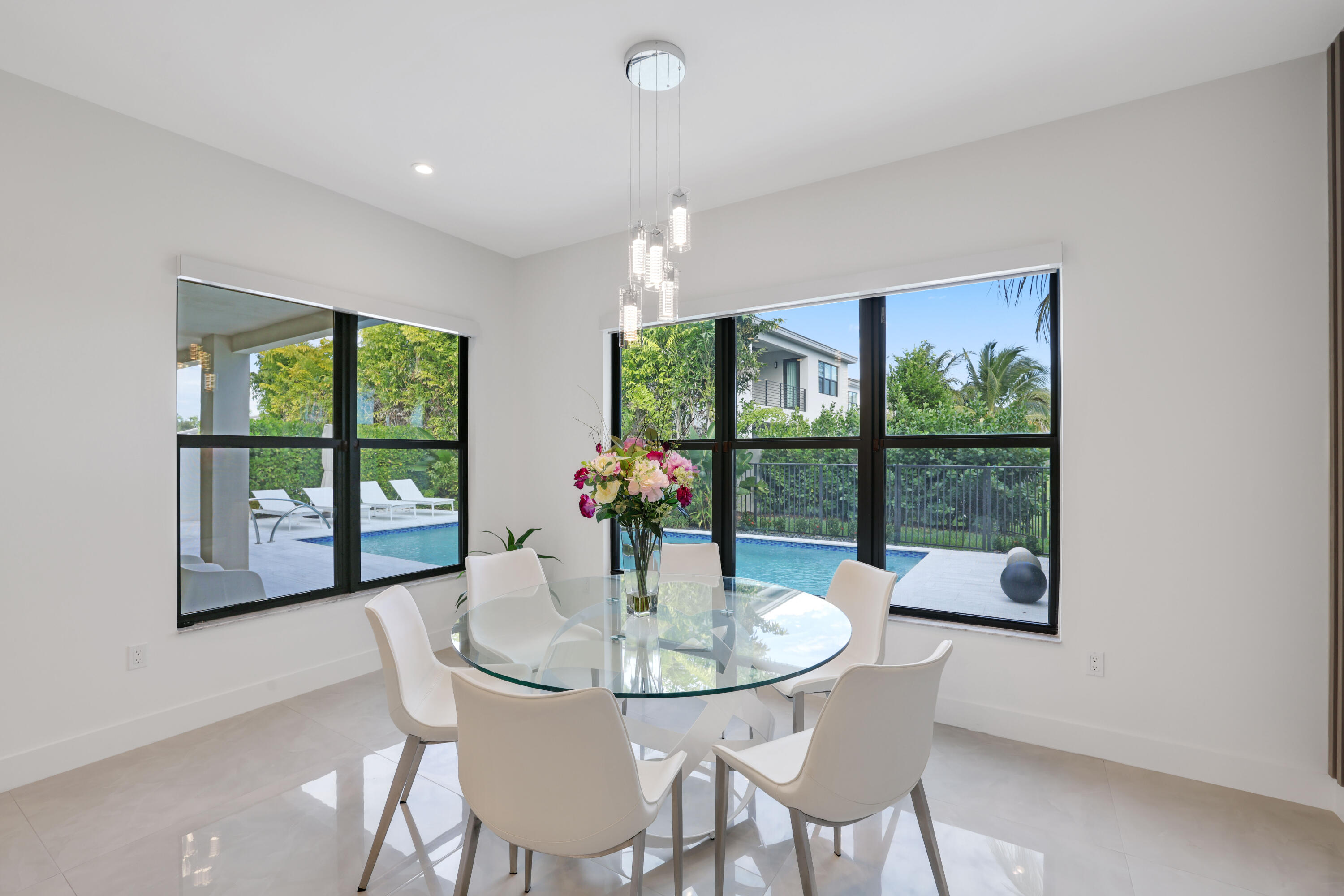 17052 Rainbow Fls Trail Boca Raton, FL 33496 - Photo 29 of 96 a view of a dining room with furniture window and outside view
