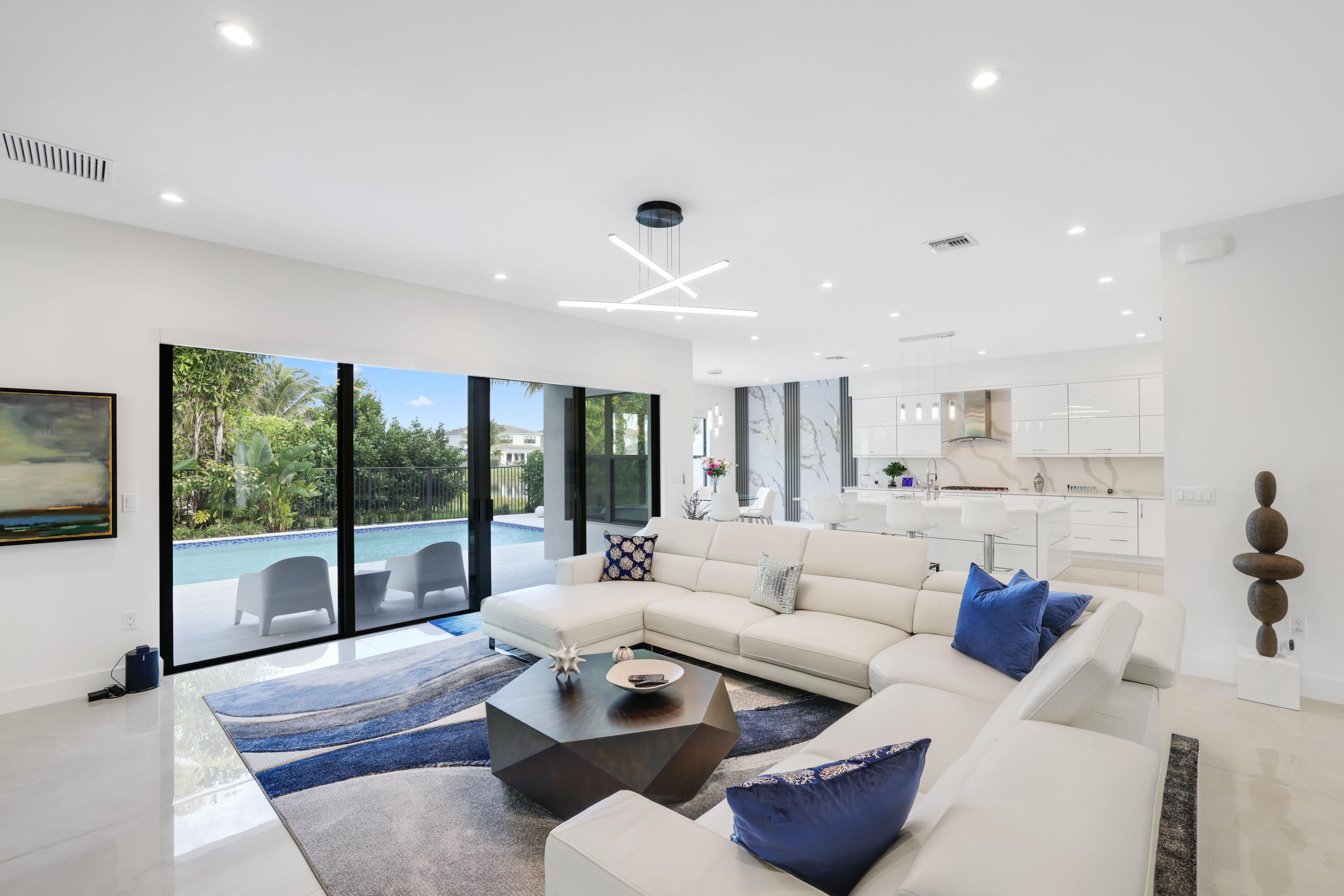 17052 Rainbow Fls Trail Boca Raton, FL 33496 - Photo 31 of 96 a living room with furniture and a large window
