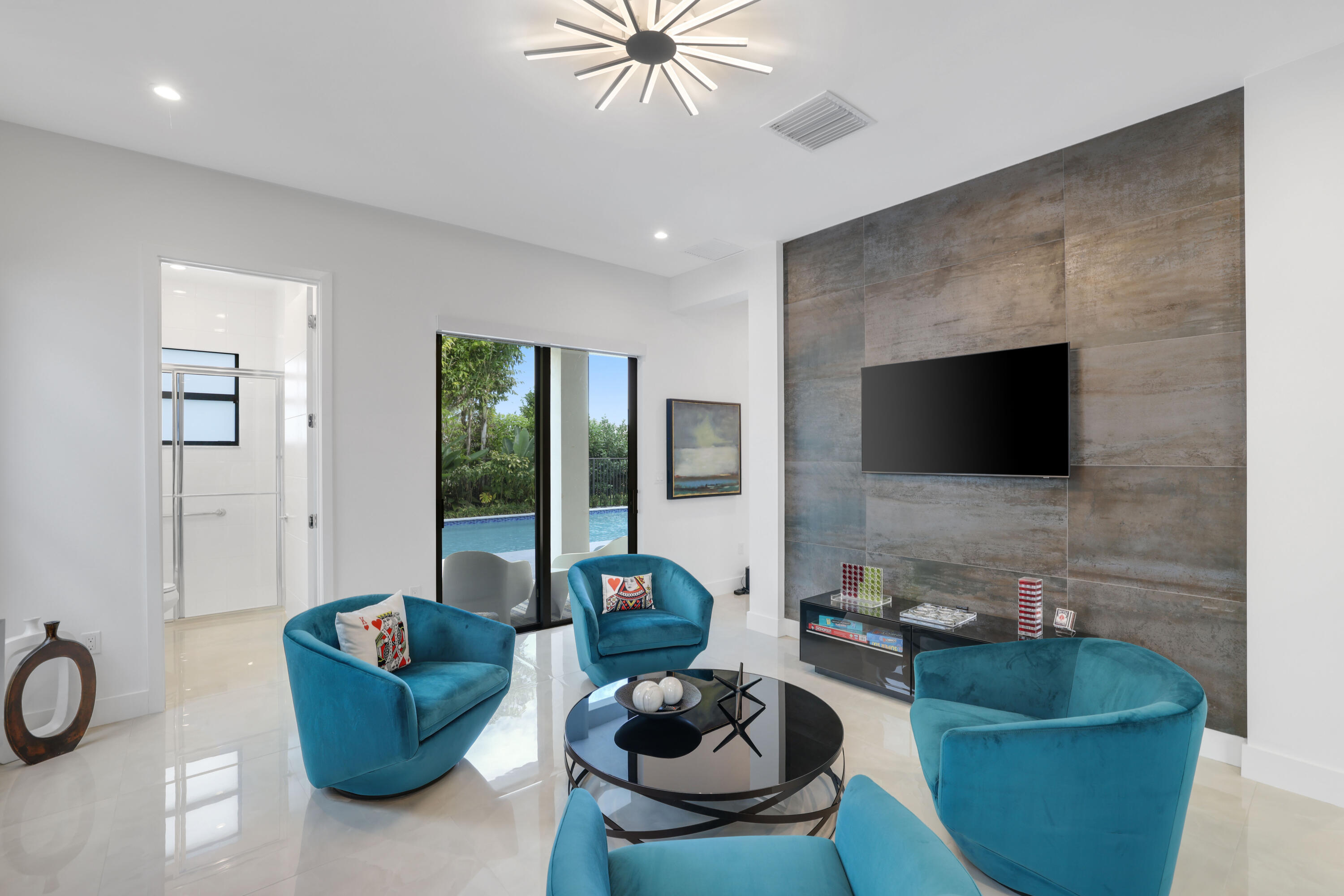 17052 Rainbow Fls Trail Boca Raton, FL 33496 - Photo 34 of 96 a living room with furniture and a flat screen tv