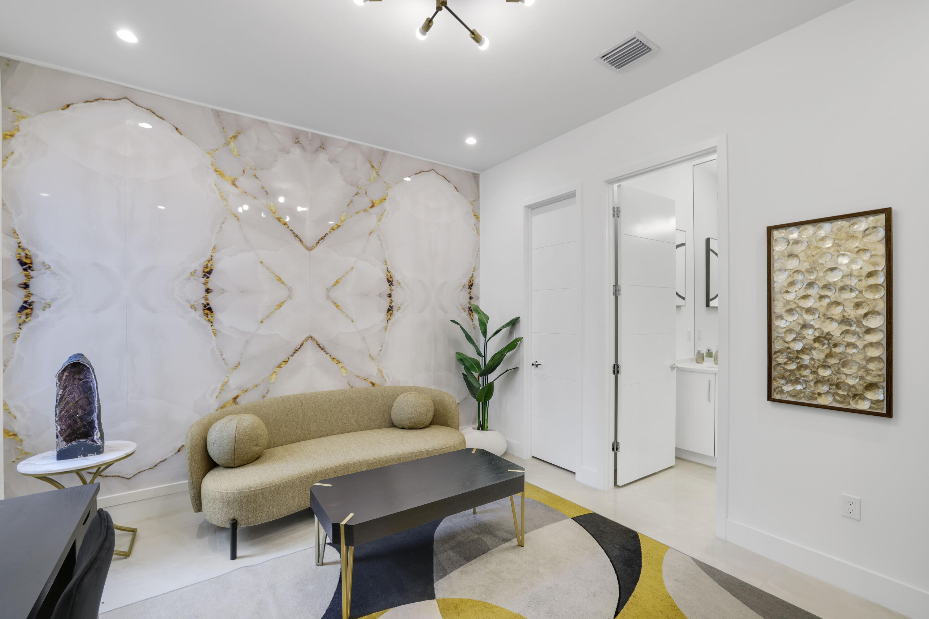 17052 Rainbow Fls Trail Boca Raton, FL 33496 - Photo 42 of 96 a living room with furniture flowers and a chandelier