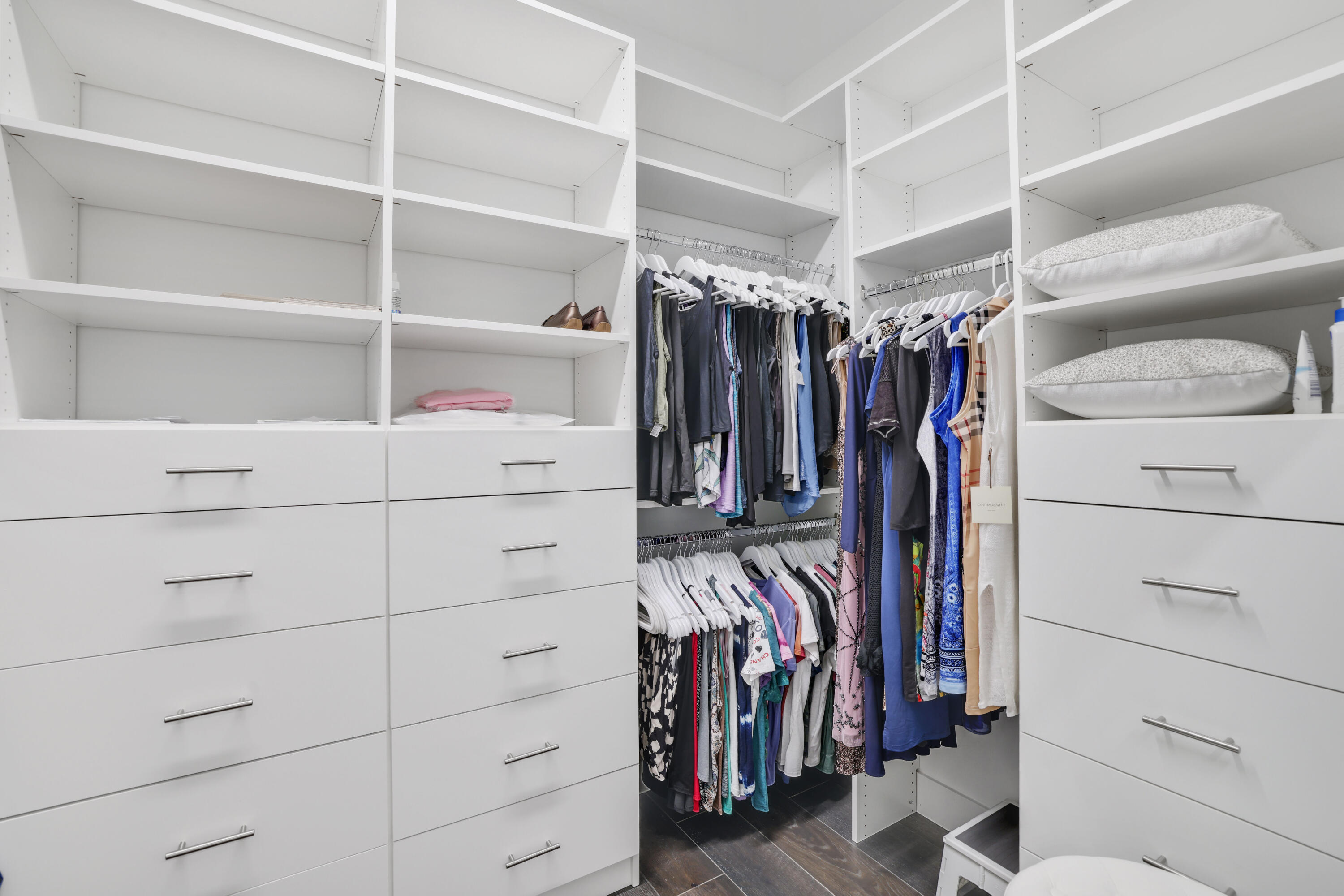 17052 Rainbow Fls Trail Boca Raton, FL 33496 - Photo 52 of 96 a view of walk in closet with clothes and shoes