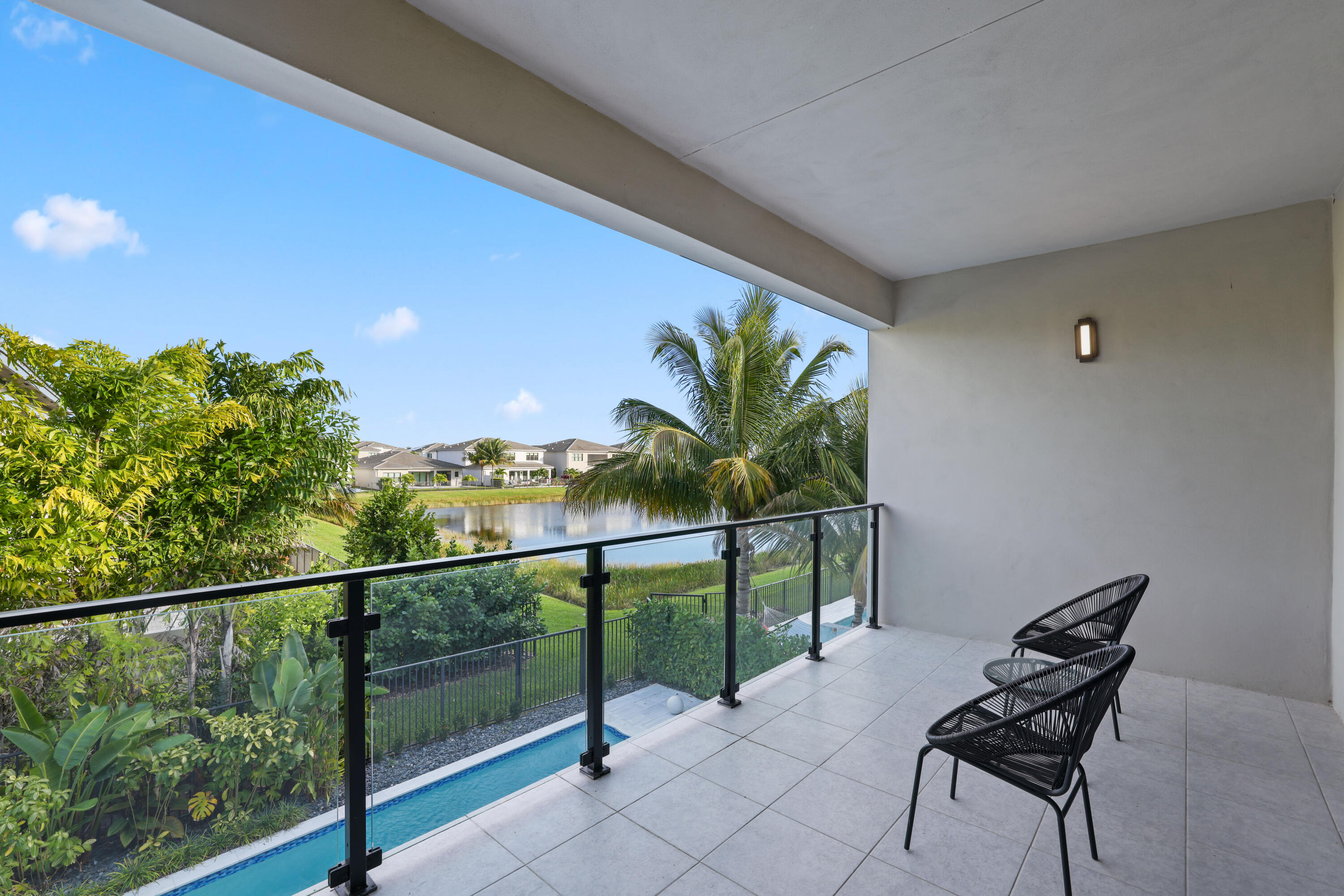 17052 Rainbow Fls Trail Boca Raton, FL 33496 - Photo 73 of 96 a view of a chairs and table in a balcony