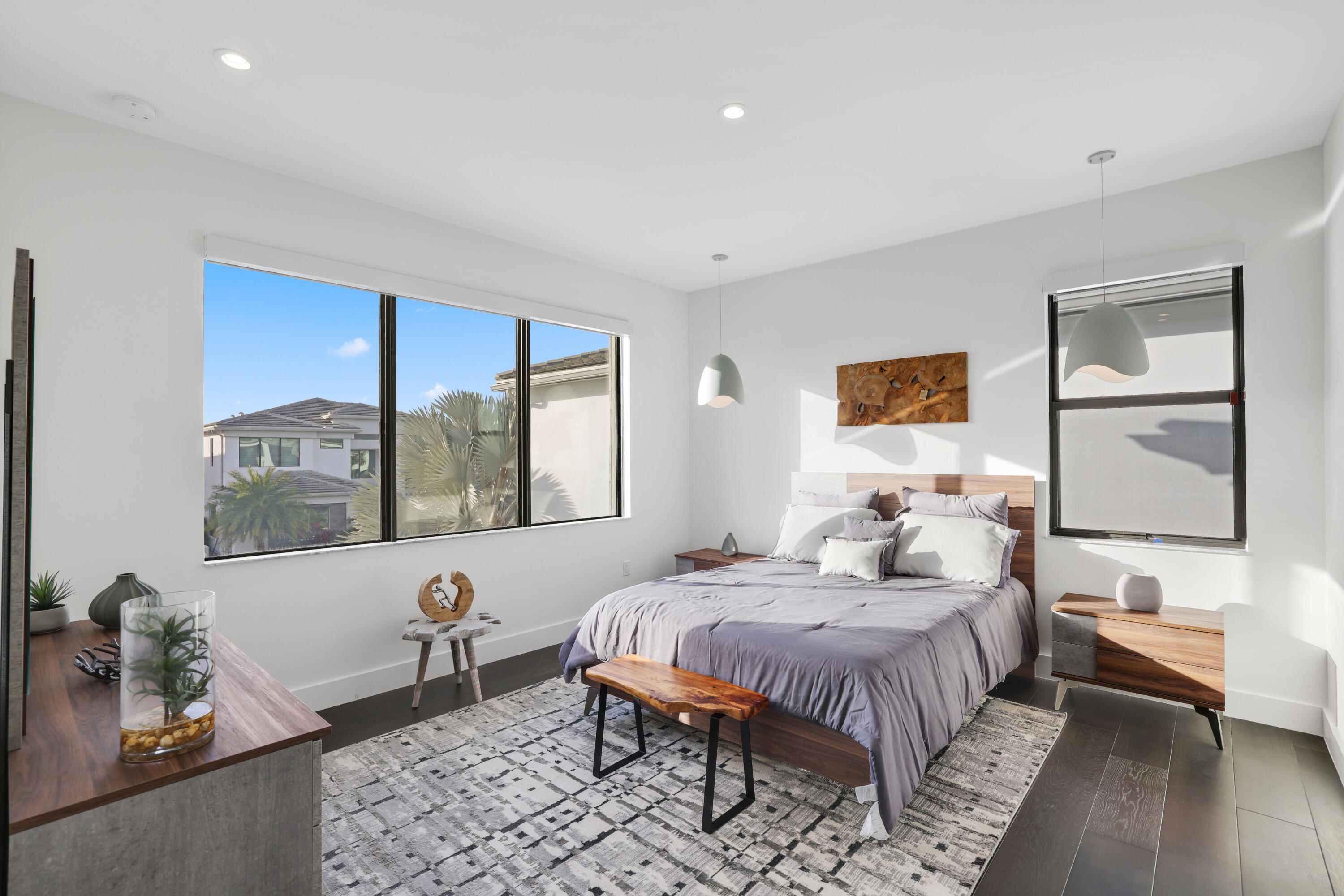 17052 Rainbow Fls Trail Boca Raton, FL 33496 - Photo 77 of 96 a bedroom with a large bed and wooden floor