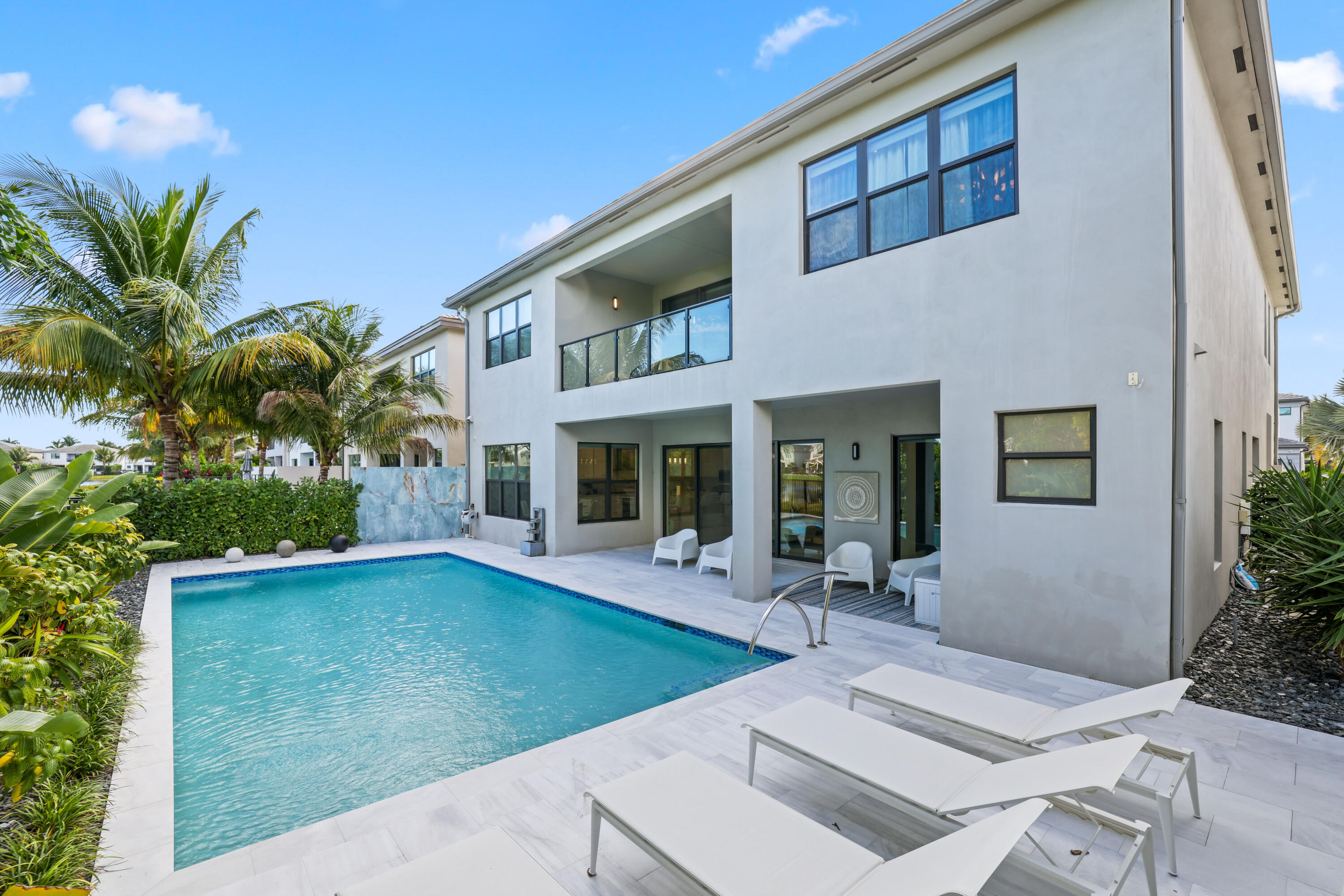 17052 Rainbow Fls Trail Boca Raton, FL 33496 - Photo 89 of 96 a view of house with yard outdoor seating and barbeque oven