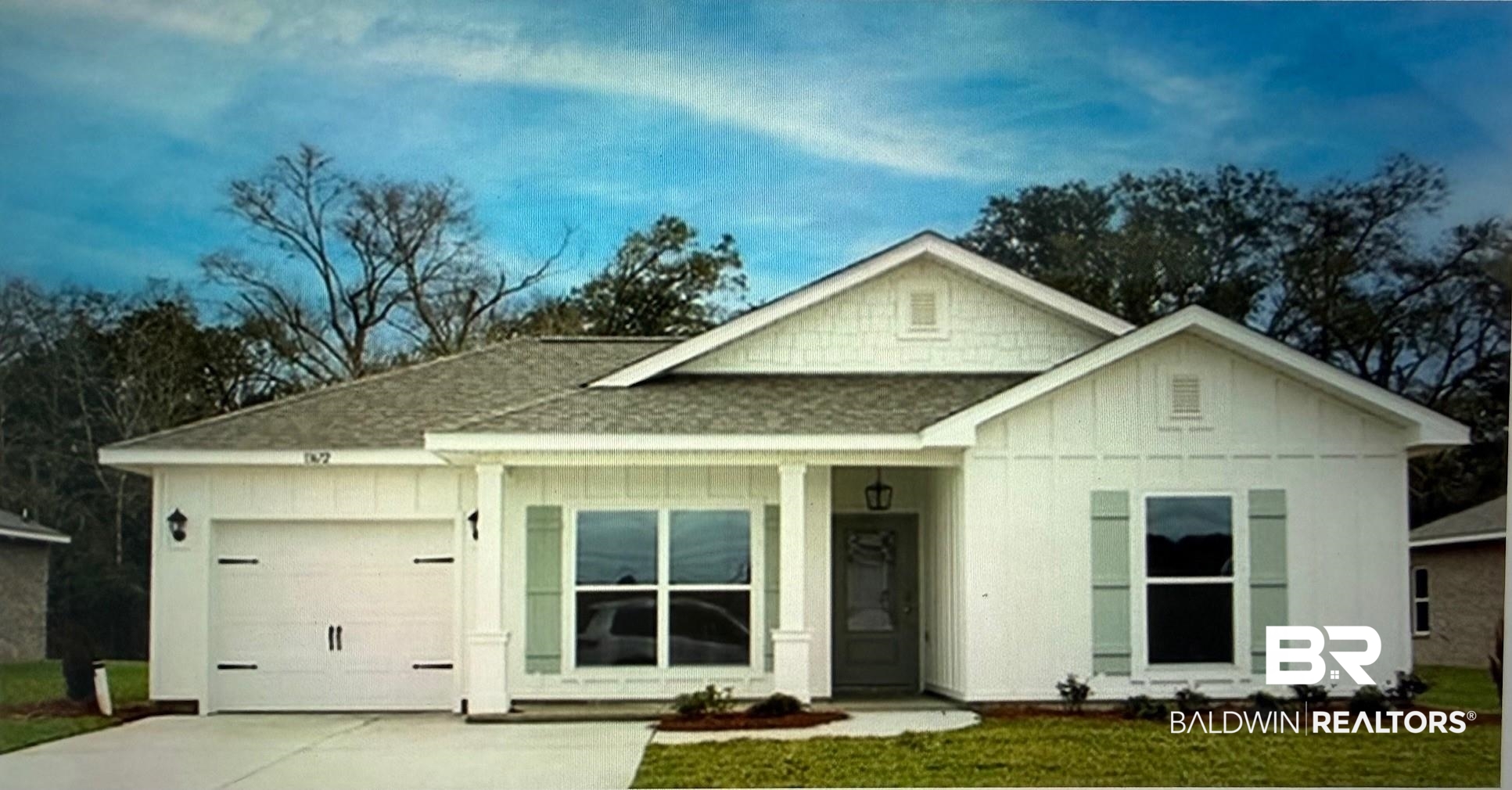 21290 Roughleaf Drive Summerdale, AL 36580 - Photo 1 of 35 View of front of property featuring a garage, a shingled roof, covered porch, board and batten siding, and a front yard