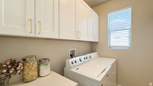 1434 West Stable Street Lindon, UT 84042 - Photo 26 of 76 Laundry area featuring separate washer and dryer and cabinet space
