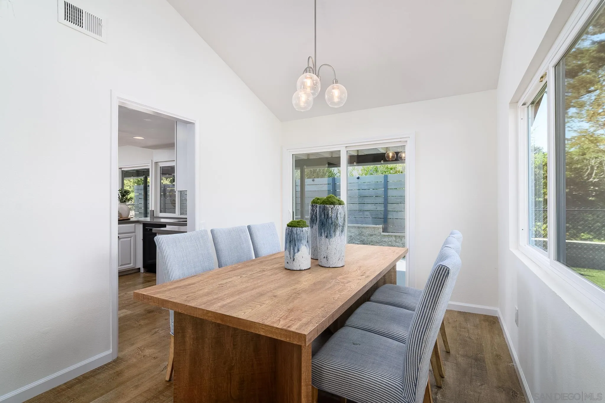 16556 Gabarda Road San Diego, CA 92128 - Photo 11 of 42 a view of a dining room with furniture window and outside view