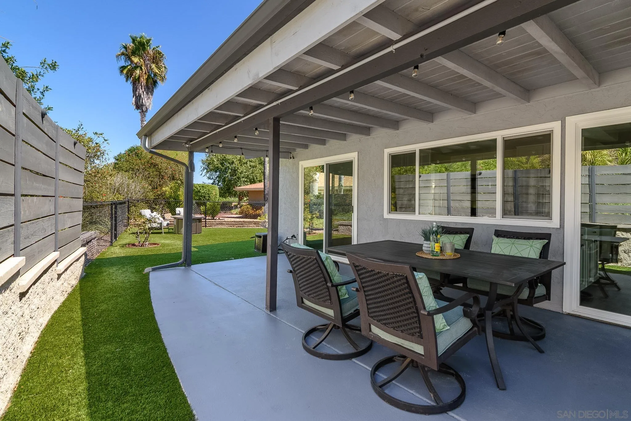 16556 Gabarda Road San Diego, CA 92128 - Photo 33 of 42 a view of a backyard with furniture and garden