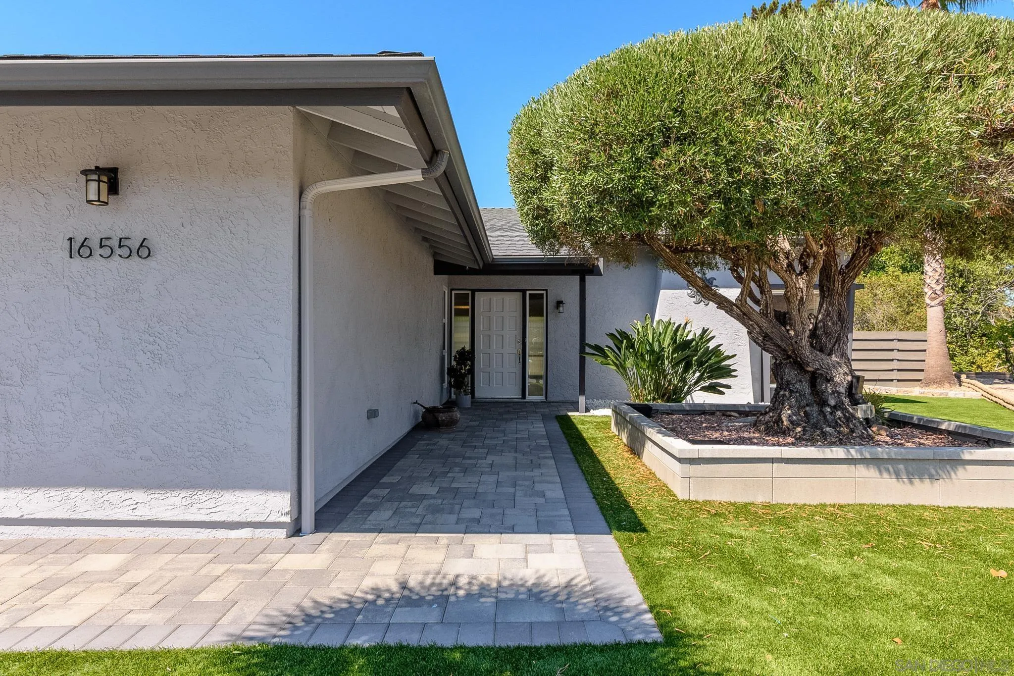 16556 Gabarda Road San Diego, CA 92128 - Photo 5 of 42 a view of a back yard of the house