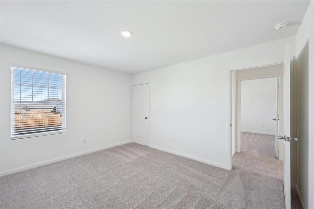 2012 Prairie Lane Melissa, TX 75454 - Photo 14 of 22 an empty room with windows
