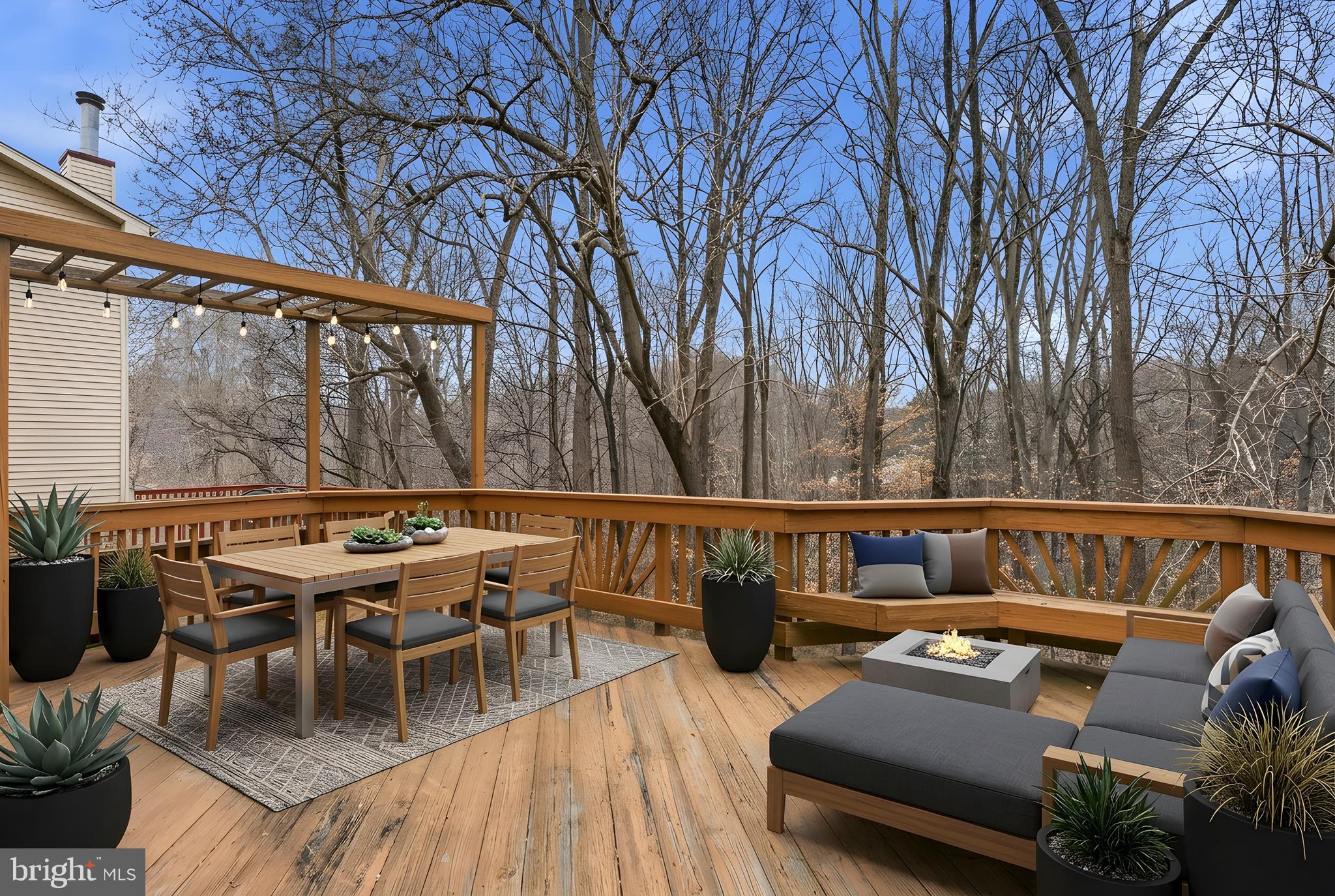 2717 Quarry Heights Way Baltimore, MD 21209 - Photo 22 of 58 a roof deck with couches and wooden floor