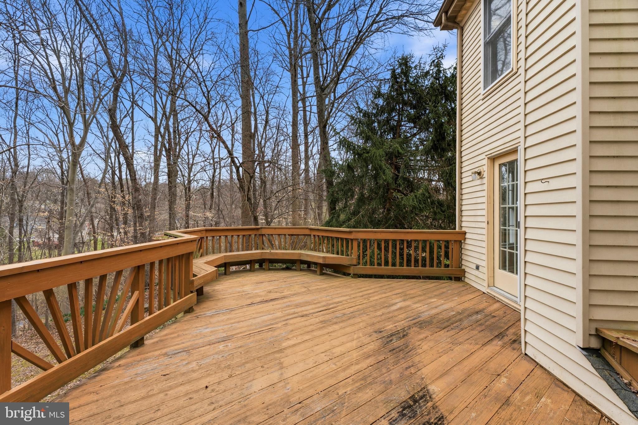 2717 Quarry Heights Way Baltimore, MD 21209 - Photo 24 of 58 a view of balcony with wooden floor and fence