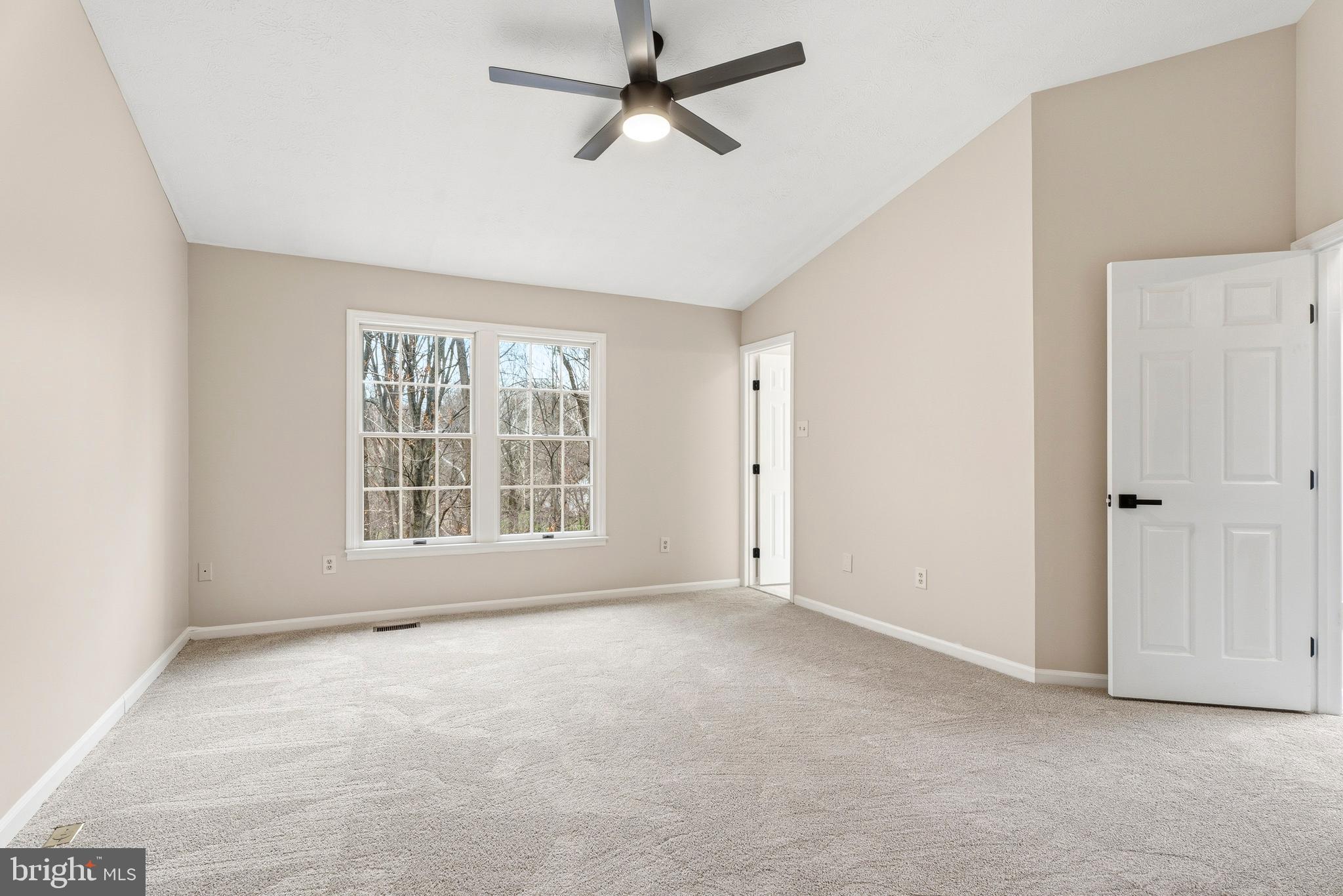 2717 Quarry Heights Way Baltimore, MD 21209 - Photo 32 of 58 a view of an empty room with a window