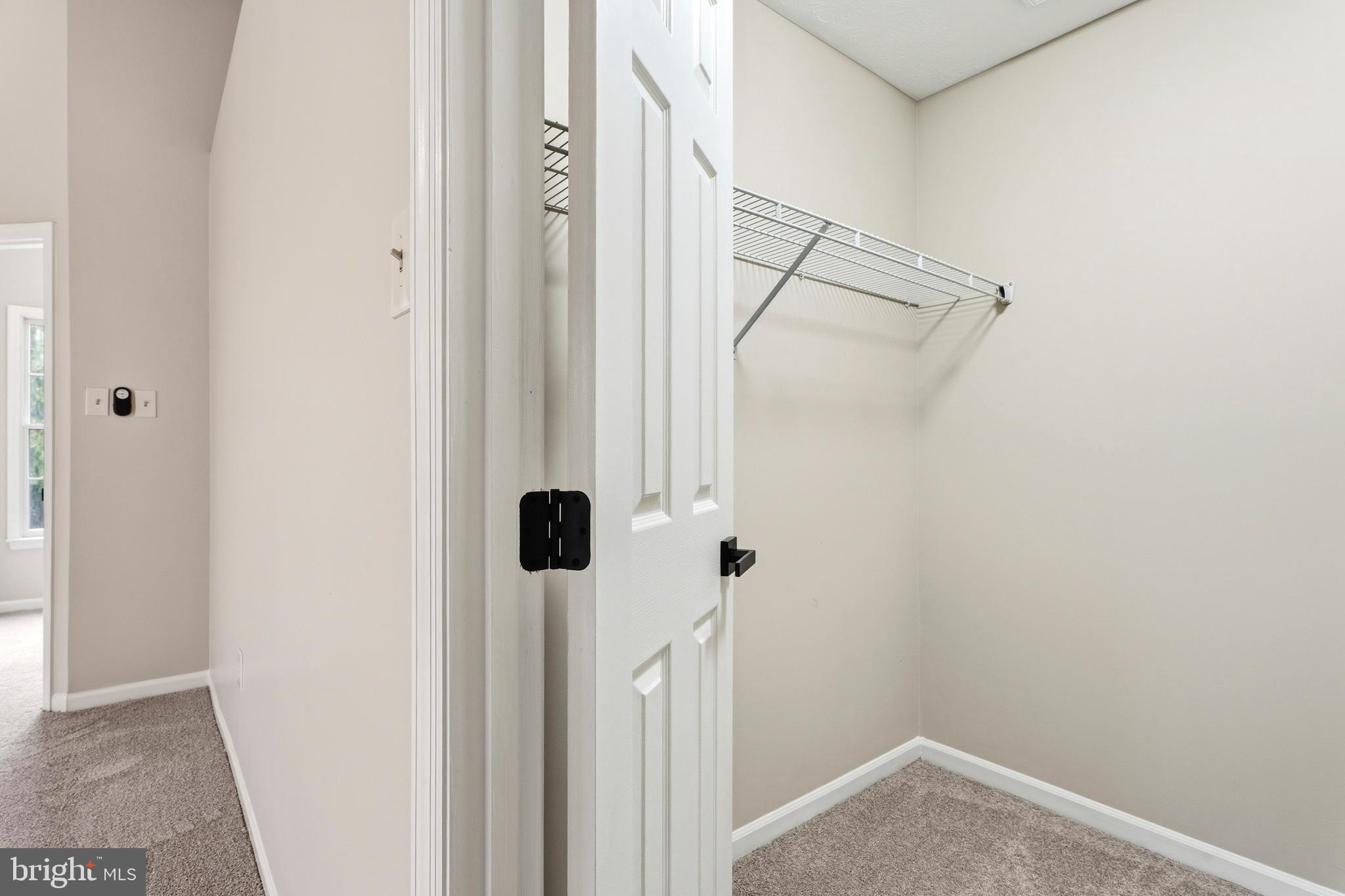 2717 Quarry Heights Way Baltimore, MD 21209 - Photo 33 of 58 a view of a room with rack on the wall