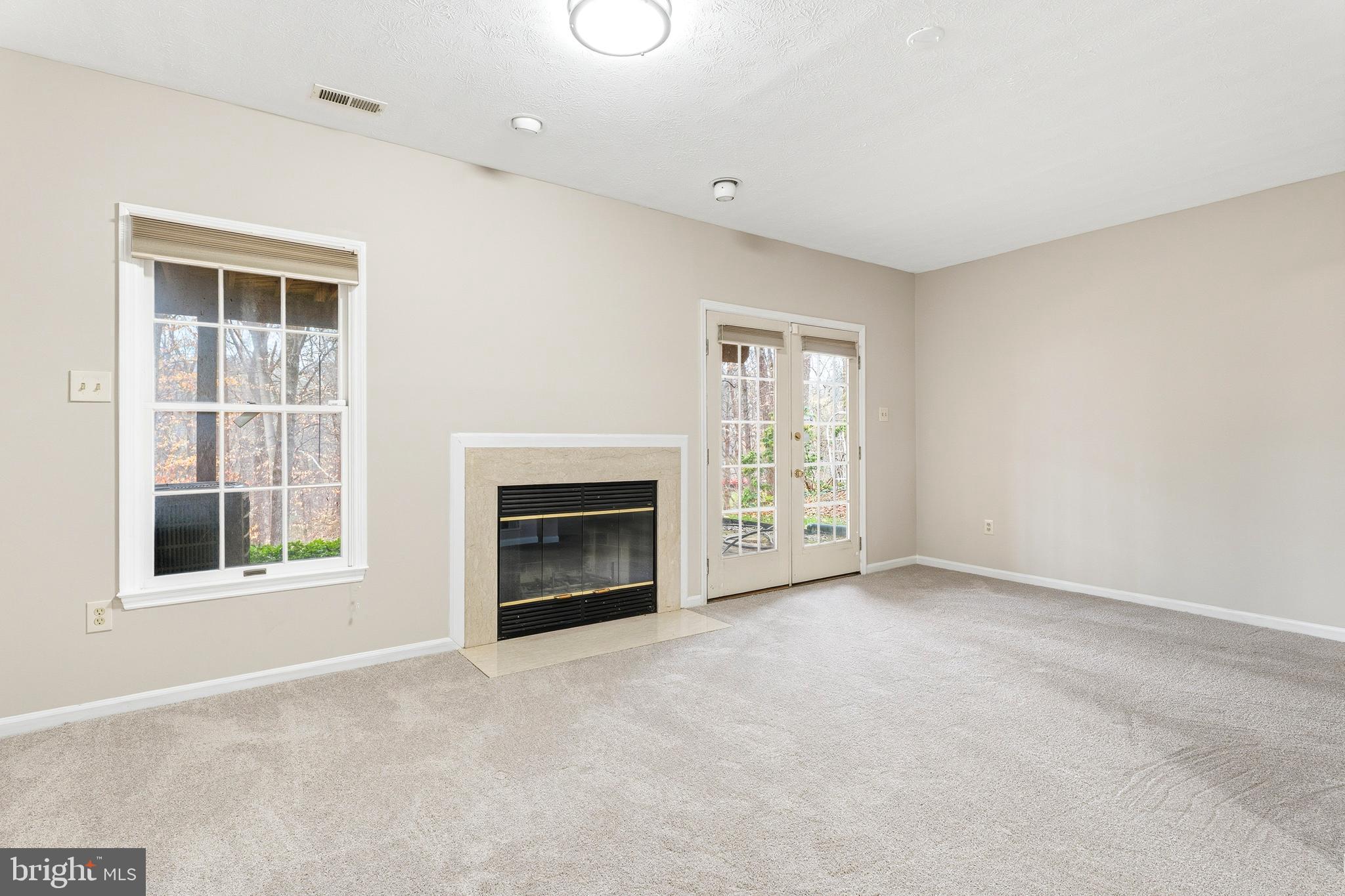 2717 Quarry Heights Way Baltimore, MD 21209 - Photo 53 of 58 a view of empty room with a fireplace