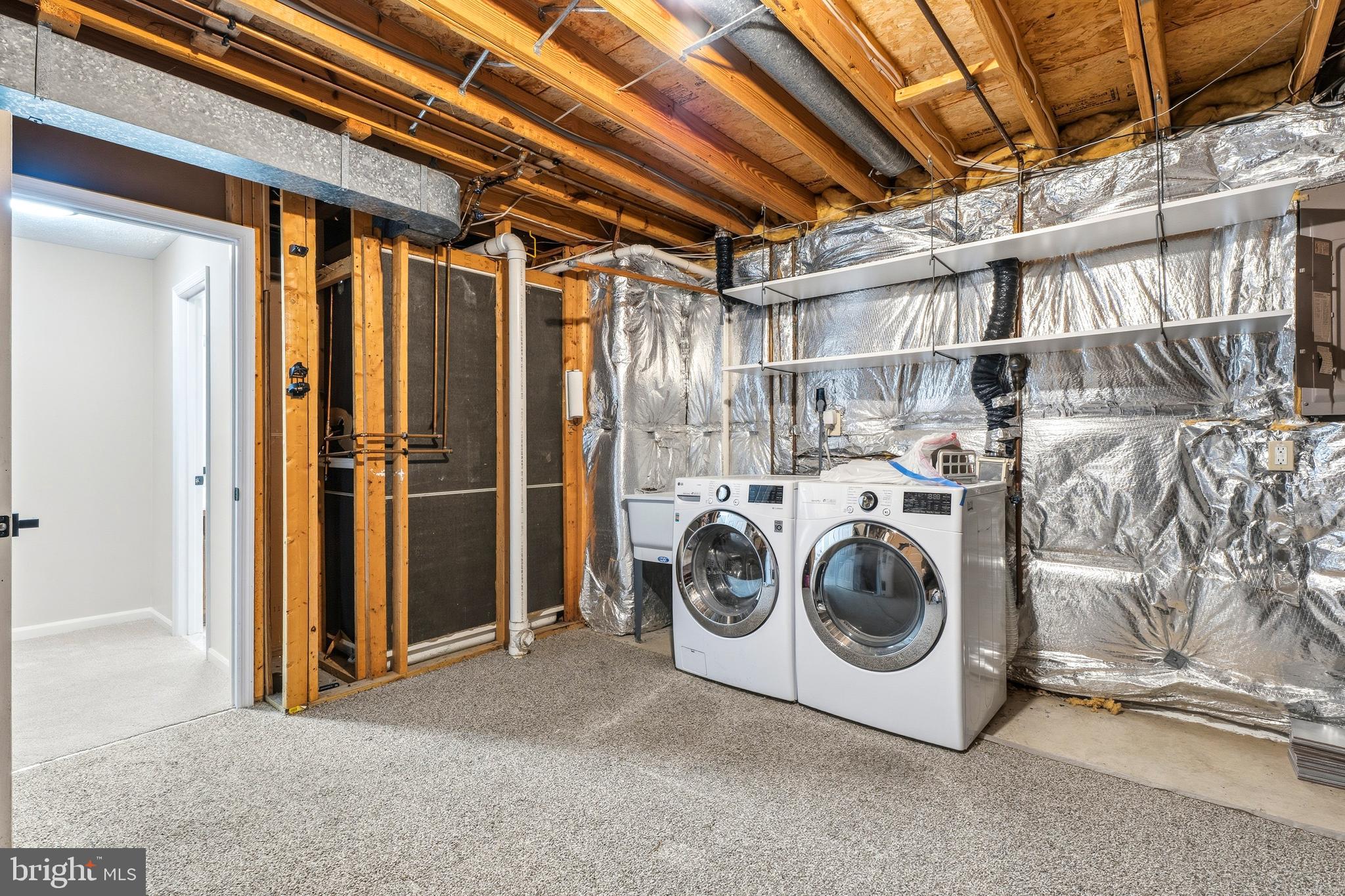 2717 Quarry Heights Way Baltimore, MD 21209 - Photo 54 of 58 a utility room with dryer and washer