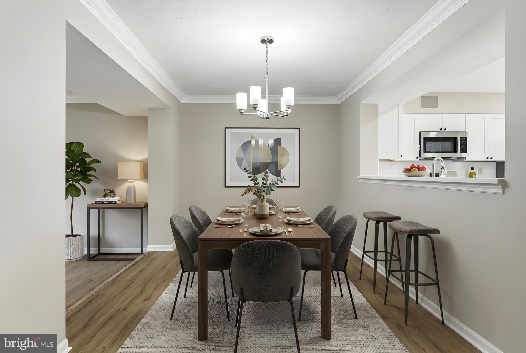 2717 Quarry Heights Way Baltimore, MD 21209 - Photo 10 of 58 a view of a dining room with furniture and chandelier