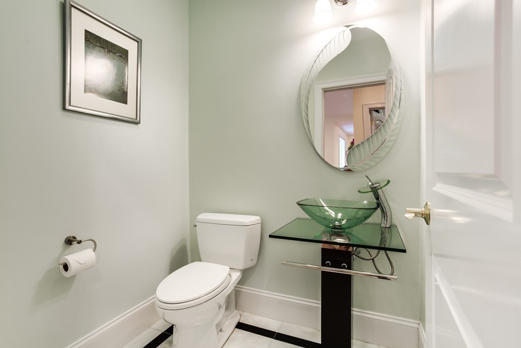 146 Pine Street Dover, MA 02030 - Photo 13 of 30 a bathroom with a toilet and a mirror