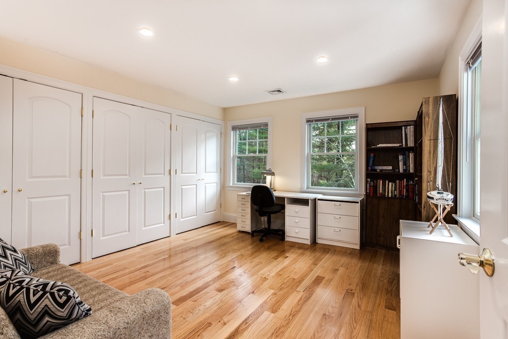 146 Pine Street Dover, MA 02030 - Photo 19 of 30 a room with a bed and furniture