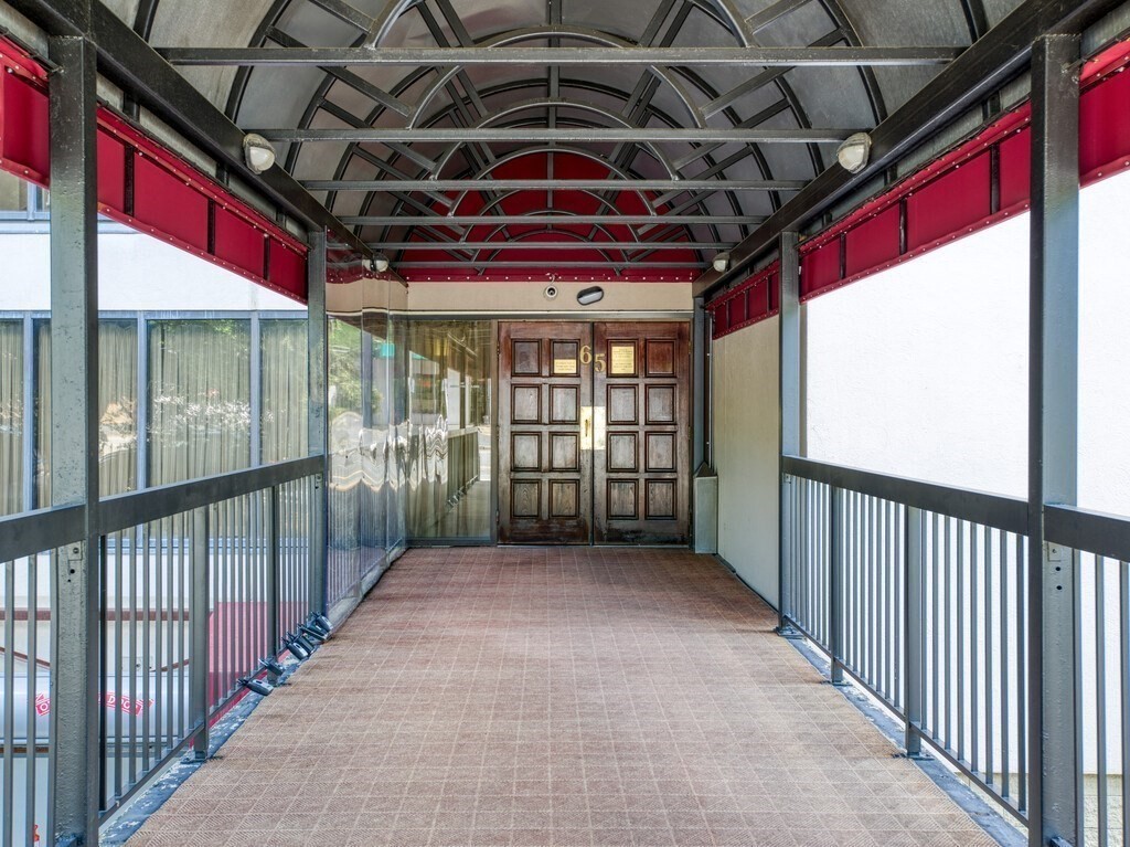 65 Lake Avenue, Unit 831 Worcester, MA 01604 - Photo 3 of 39 a view of porch with red door