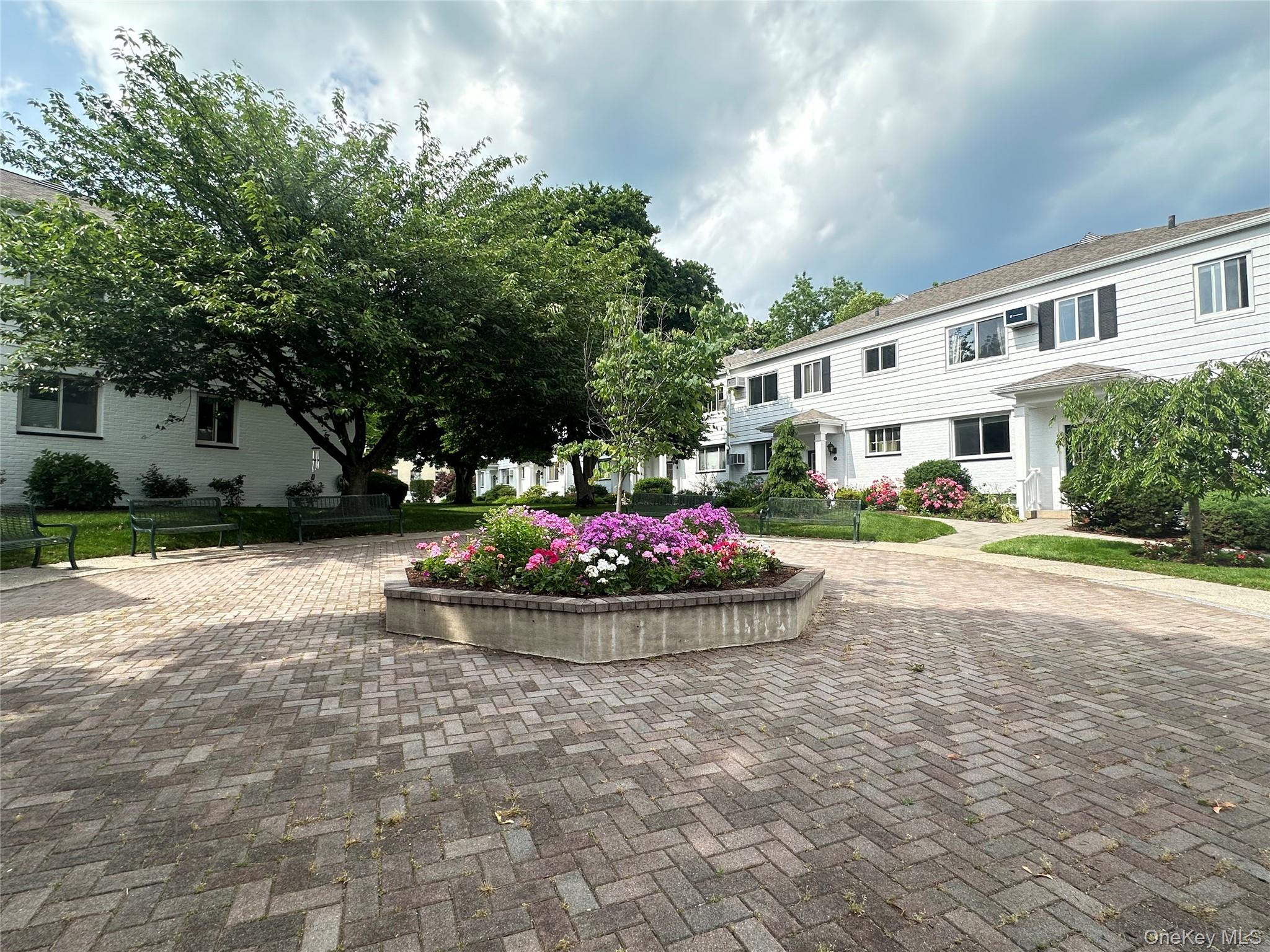 129 Fenimore Road, Unit 129B Mamaroneck, NY 10543 - Photo 13 of 19 Beautiful professionally landscaped grounds. Common BBQ area overlooking the Harbor.