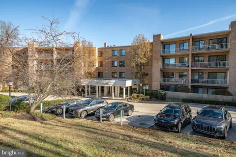 a building outdoor space with lots of trees in the background