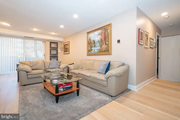 a living room with furniture and a couch