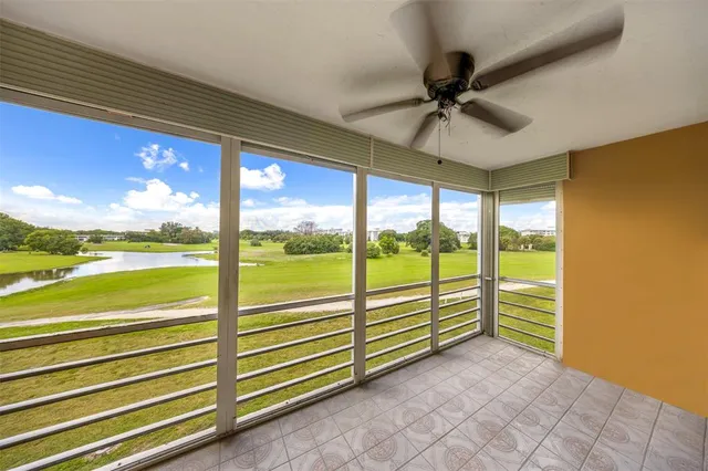 a view of a ocean from a ceiling fan