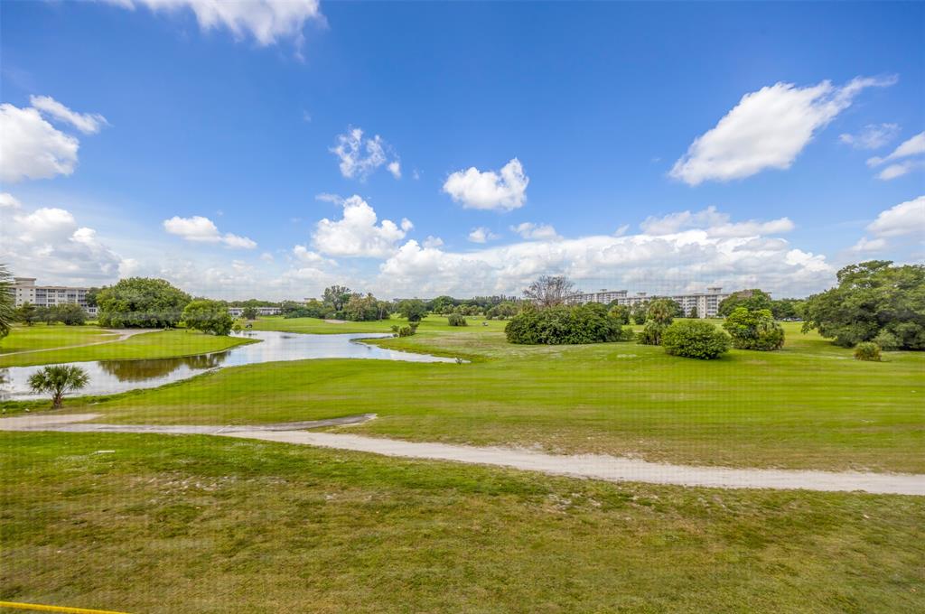2681 South Course Drive, Unit 301 Pompano Beach, FL 33069 - Photo 21 of 27 a view of an ocean and beach