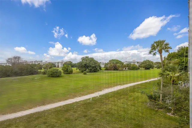 a view of a lake with a big yard