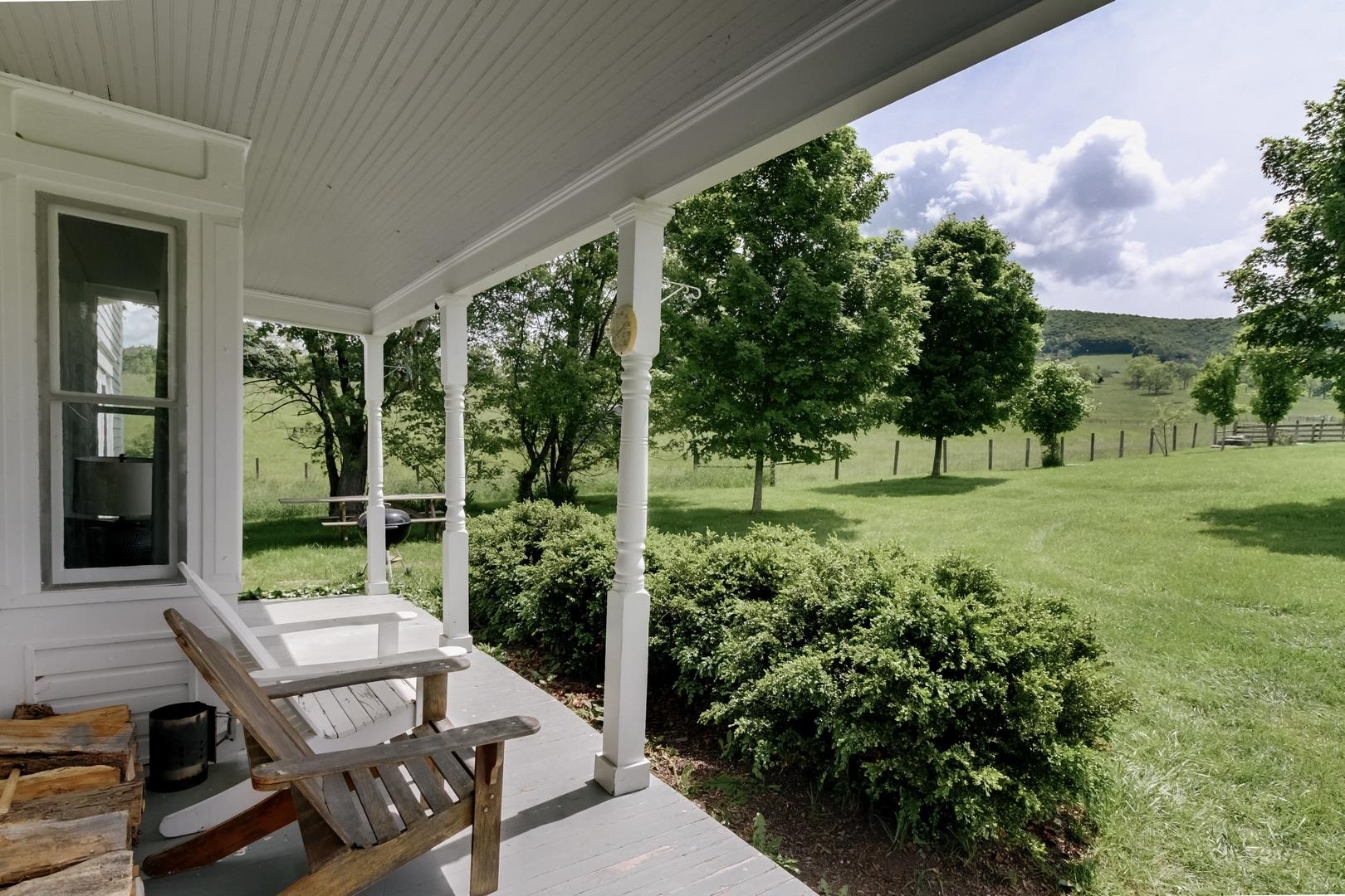 4181 Maple Sugar Road Monterey, VA 24465 - Photo 3 of 27 a view of a chair and tables in the backyard