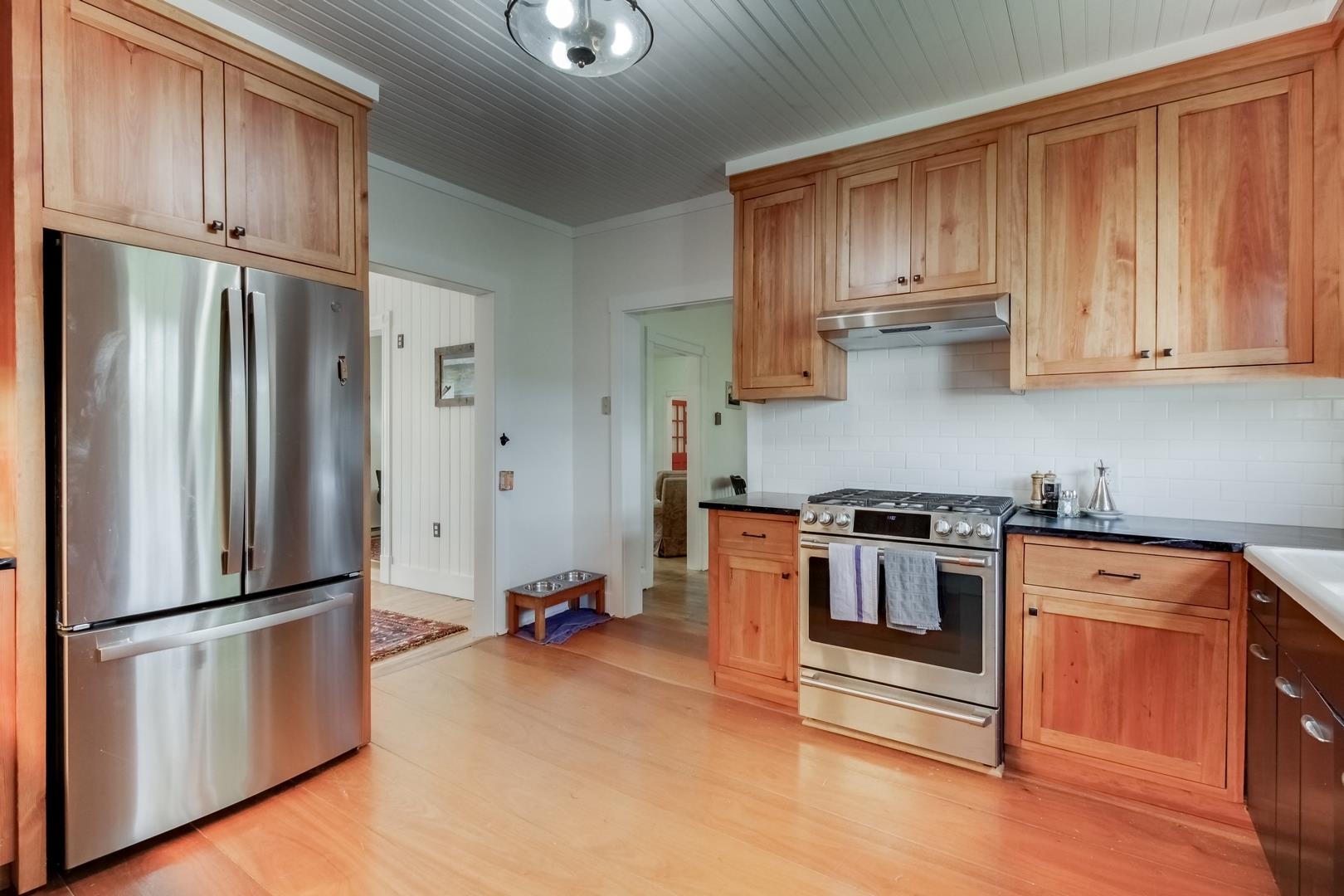 4181 Maple Sugar Road Monterey, VA 24465 - Photo 8 of 27 a kitchen with stainless steel appliances granite countertop a refrigerator stove and sink
