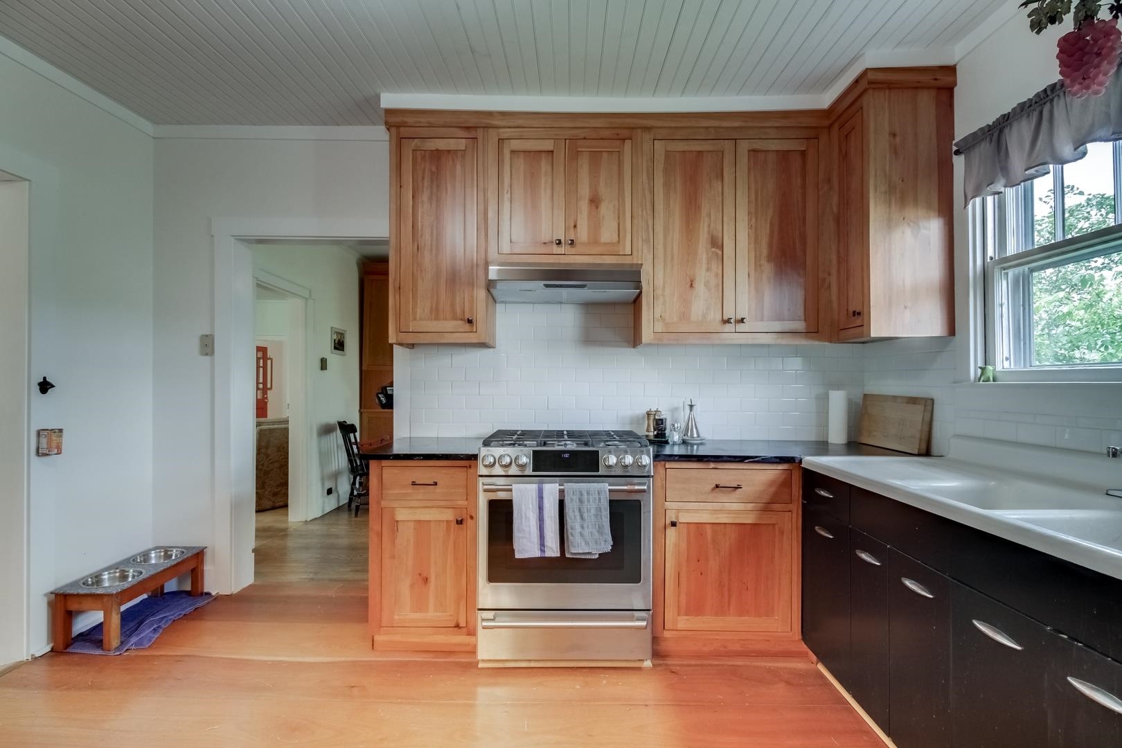 4181 Maple Sugar Road Monterey, VA 24465 - Photo 10 of 27 a kitchen with stainless steel appliances granite countertop a stove and a sink