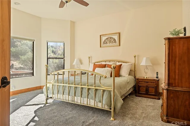 a bed room with a bed and a window