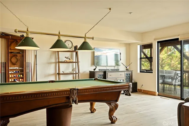 a bed room with bed and windows